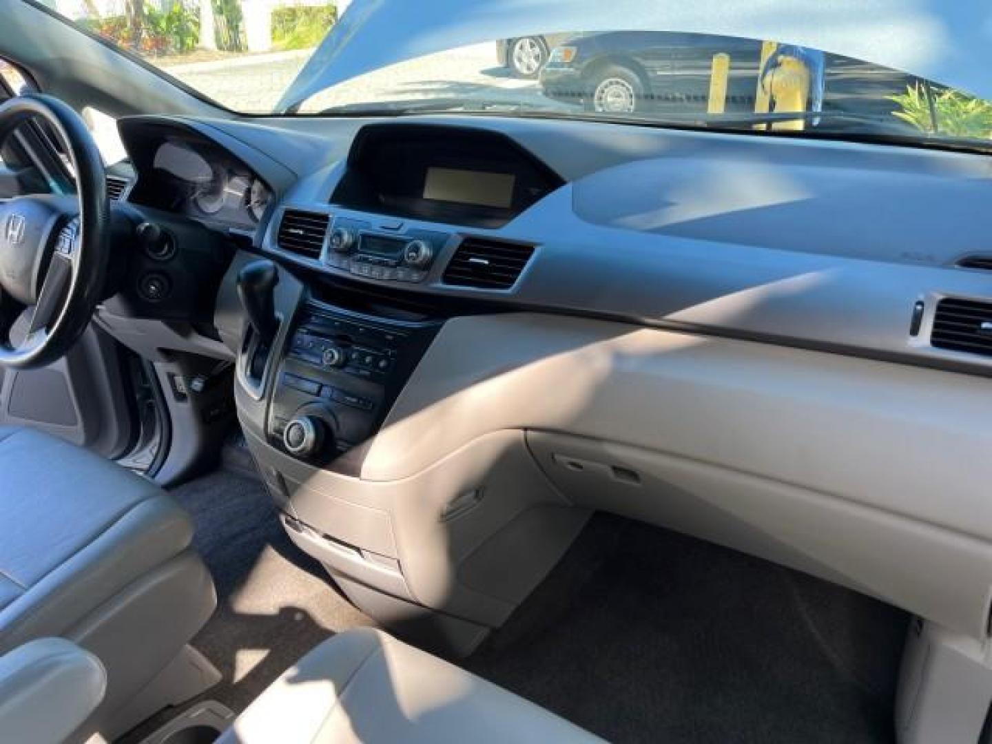 2011 Alabaster Silver Metallic /Gray Honda Odyssey LEATHER LX LOW MILES 70,192 (5FNRL5H21BB) with an 3.5L SOHC MPFI 24-Valve i-VTEC V6 Engine engine, Automatic transmission, located at 4701 North Dixie Hwy, Pompano Beach, FL, 33064, (954) 422-2889, 26.240938, -80.123474 - 2011 HONDA ODYSSEY LX LEATHER ROAD READY 3.5L V6 VIN: 5FNRL5H21BB053893 NO ACCIDENTS NO RECALLS VAN $28,800 NEW FLORIDA OWNER 27 MPG 3.5L V6 F SOHC 24V 3 ROW POWER LEATHER SEATS GASOLINE 26 SERVICE RECORDS FRONT WHEEL DRIVE NEW LIKE TIRES DUAL ZONE AC LOW MILES 70,192 Active Head Restraints Anti-The - Photo#26