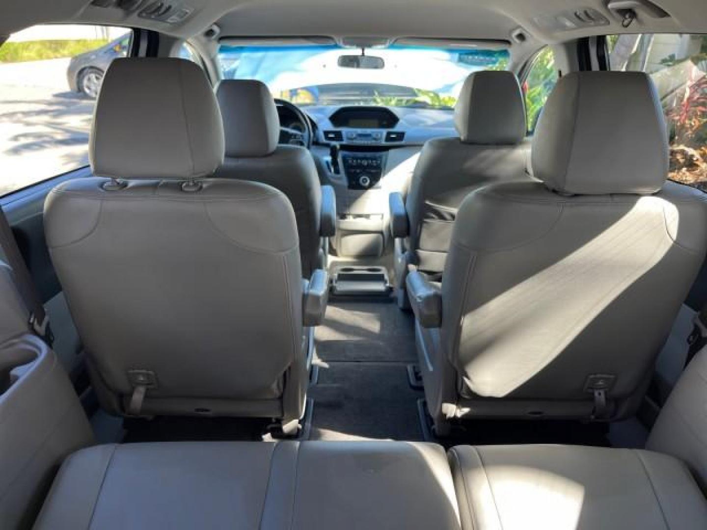 2011 Alabaster Silver Metallic /Gray Honda Odyssey LEATHER LX LOW MILES 70,192 (5FNRL5H21BB) with an 3.5L SOHC MPFI 24-Valve i-VTEC V6 Engine engine, Automatic transmission, located at 4701 North Dixie Hwy, Pompano Beach, FL, 33064, (954) 422-2889, 26.240938, -80.123474 - 2011 HONDA ODYSSEY LX LEATHER ROAD READY 3.5L V6 VIN: 5FNRL5H21BB053893 NO ACCIDENTS NO RECALLS VAN $28,800 NEW FLORIDA OWNER 27 MPG 3.5L V6 F SOHC 24V 3 ROW POWER LEATHER SEATS GASOLINE 26 SERVICE RECORDS FRONT WHEEL DRIVE NEW LIKE TIRES DUAL ZONE AC LOW MILES 70,192 Active Head Restraints Anti-The - Photo#68