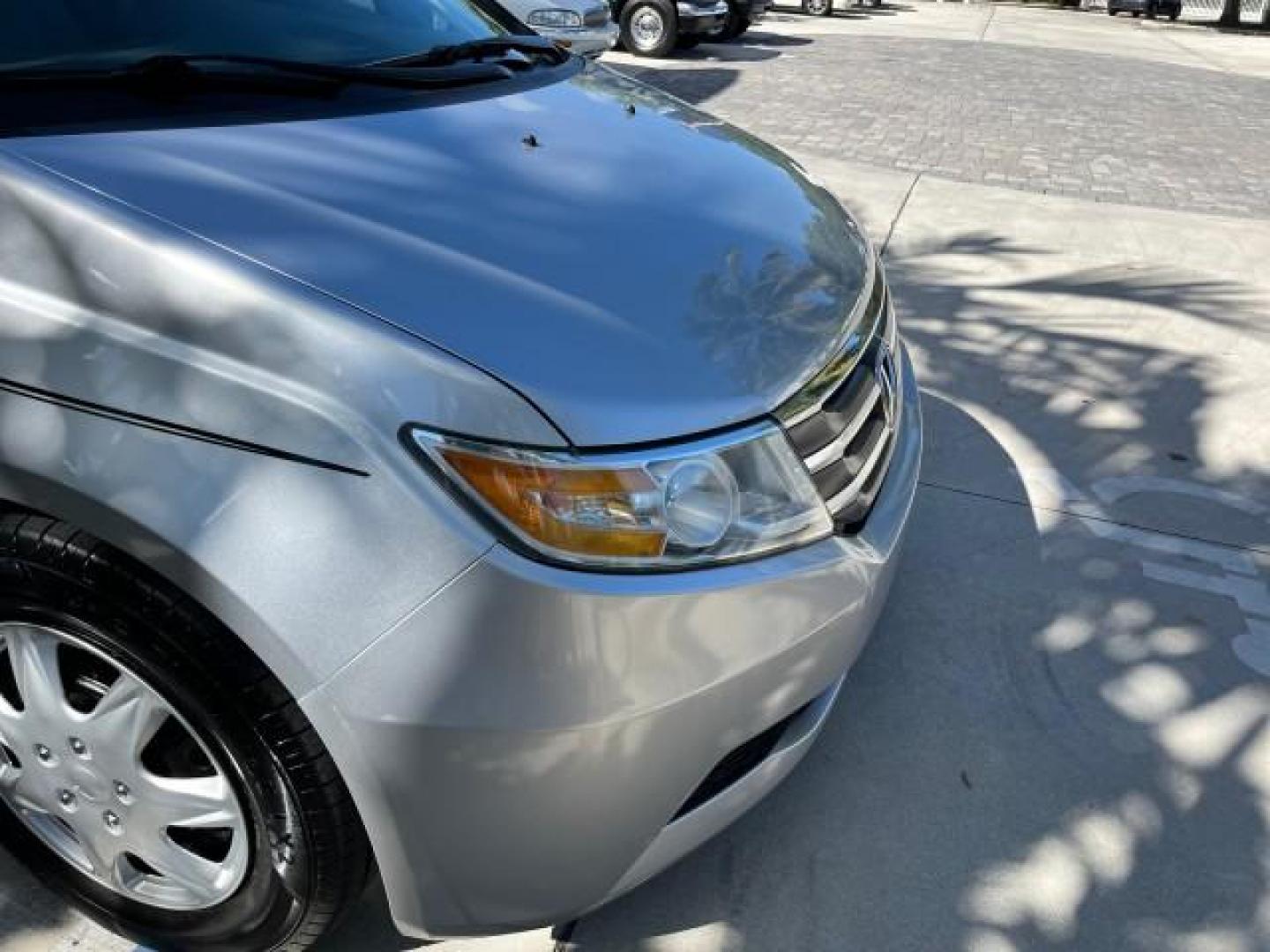 2011 Alabaster Silver Metallic /Gray Honda Odyssey LEATHER LX LOW MILES 70,192 (5FNRL5H21BB) with an 3.5L SOHC MPFI 24-Valve i-VTEC V6 Engine engine, Automatic transmission, located at 4701 North Dixie Hwy, Pompano Beach, FL, 33064, (954) 422-2889, 26.240938, -80.123474 - 2011 HONDA ODYSSEY LX LEATHER ROAD READY 3.5L V6 VIN: 5FNRL5H21BB053893 NO ACCIDENTS NO RECALLS VAN $28,800 NEW FLORIDA OWNER 27 MPG 3.5L V6 F SOHC 24V 3 ROW POWER LEATHER SEATS GASOLINE 26 SERVICE RECORDS FRONT WHEEL DRIVE NEW LIKE TIRES DUAL ZONE AC LOW MILES 70,192 Active Head Restraints Anti-The - Photo#83