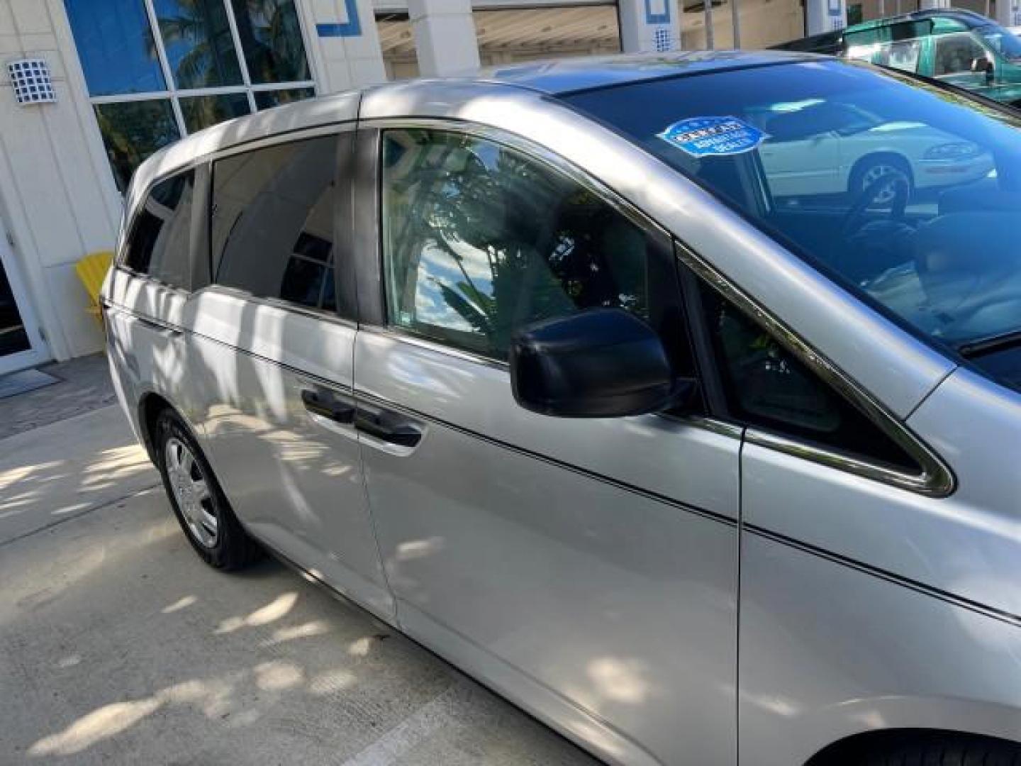 2011 Alabaster Silver Metallic /Gray Honda Odyssey LEATHER LX LOW MILES 70,192 (5FNRL5H21BB) with an 3.5L SOHC MPFI 24-Valve i-VTEC V6 Engine engine, Automatic transmission, located at 4701 North Dixie Hwy, Pompano Beach, FL, 33064, (954) 422-2889, 26.240938, -80.123474 - 2011 HONDA ODYSSEY LX LEATHER ROAD READY 3.5L V6 VIN: 5FNRL5H21BB053893 NO ACCIDENTS NO RECALLS VAN $28,800 NEW FLORIDA OWNER 27 MPG 3.5L V6 F SOHC 24V 3 ROW POWER LEATHER SEATS GASOLINE 26 SERVICE RECORDS FRONT WHEEL DRIVE NEW LIKE TIRES DUAL ZONE AC LOW MILES 70,192 Active Head Restraints Anti-The - Photo#85