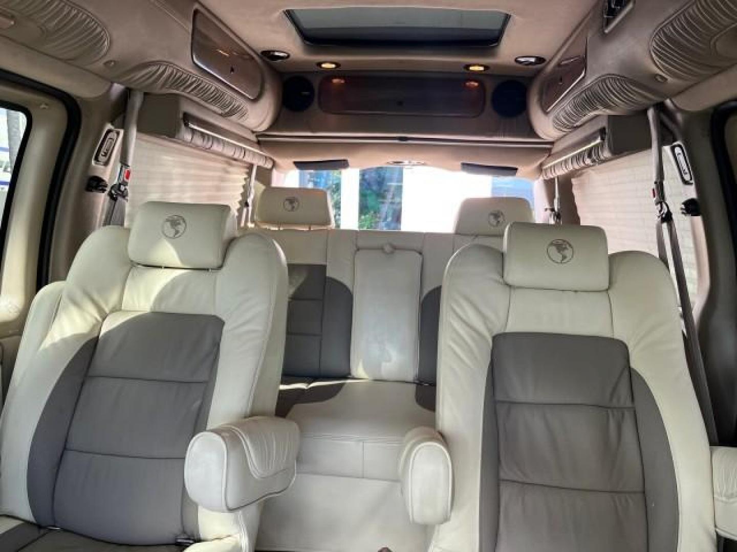 2008 Sandstone Metallic /Neutral Chevrolet Express EXPLORER HI TOP Van LOW MILES 81,518 (1GBFG154281) with an 5.3L Vortec 1000 V8 SFI Engine engine, Automatic transmission, located at 4701 North Dixie Hwy, Pompano Beach, FL, 33064, (954) 422-2889, 26.240938, -80.123474 - 2008 CHEVROLET EXPRESS G1500 MINT PEARL FADE ROAD READY LOW MILES 81,518 VIN: 1GBFG154281174752 NO ACCIDENTS NO RECALLS VAN NAVIGATION DVD ENTERTAINMENT 5.3L V8 F OHV FLORIDA OWNER LEATHER FLEX FUEL 15 SERVICE RECORDS POWER SEATS AND MIRRORS REAR WHEEL DRIVE DUAL ZONE AC BACKUP SENSORS+CAMERA ABS Br - Photo#81