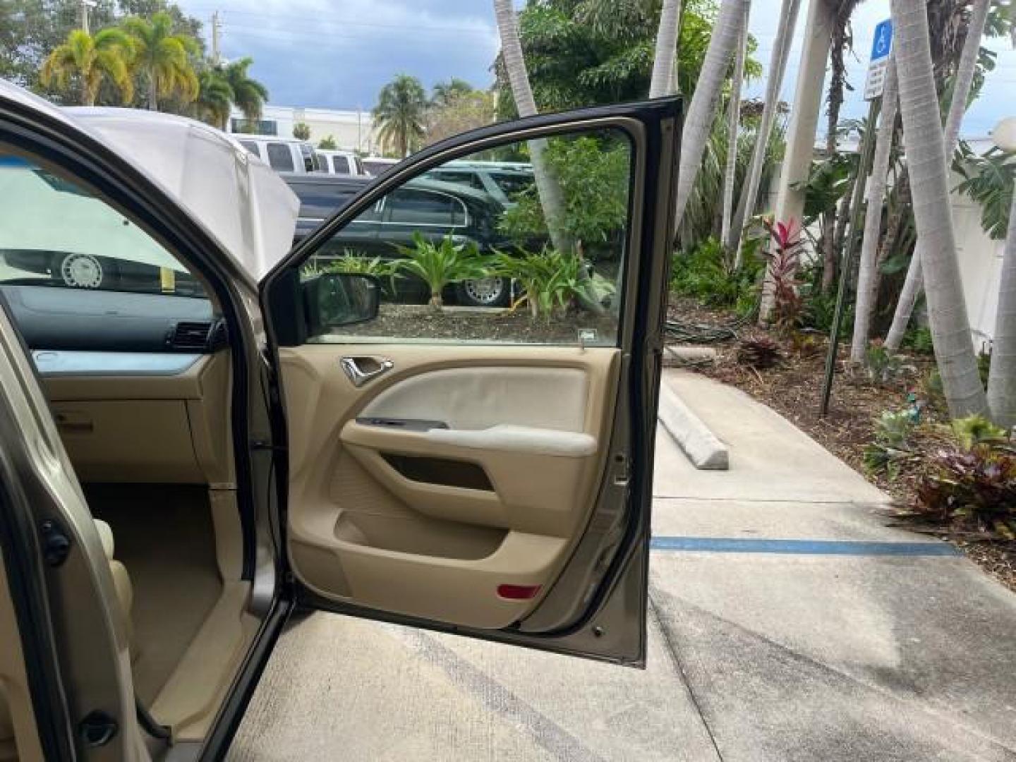 2010 Mocha Metallic /Gray Honda Odyssey LX LOW MILES 49,834 (5FNRL3H2XAB) with an 3.5L SOHC MPFI 24-Valve VTEC V6 Engine engine, Automatic transmission, located at 4701 North Dixie Hwy, Pompano Beach, FL, 33064, (954) 422-2889, 26.240938, -80.123474 - 2010 HONDA ODYSSEY LX NEW $ 31,189 ROAD READY VIN: 5FNRL3H2XAB056567 NO ACCIDENTS NO RECALLS VAN FLORIDA OWNER 3.5L V6 3.5L V6 F SOHC 24V 11 SERVICE RECORDS GASOLINE 3 ROW SEATS DUAL ZONE AC FRONT WHEEL DRIVE LOW MILES 49,834 Active Head Restraints Anti-Theft System Braking Assist Cruise Control Cur - Photo#11