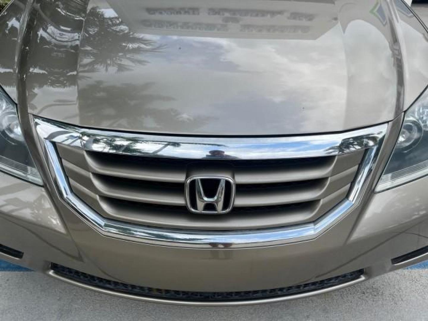 2010 Mocha Metallic /Gray Honda Odyssey LX LOW MILES 49,834 (5FNRL3H2XAB) with an 3.5L SOHC MPFI 24-Valve VTEC V6 Engine engine, Automatic transmission, located at 4701 North Dixie Hwy, Pompano Beach, FL, 33064, (954) 422-2889, 26.240938, -80.123474 - 2010 HONDA ODYSSEY LX NEW $ 31,189 ROAD READY VIN: 5FNRL3H2XAB056567 NO ACCIDENTS NO RECALLS VAN FLORIDA OWNER 3.5L V6 3.5L V6 F SOHC 24V 11 SERVICE RECORDS GASOLINE 3 ROW SEATS DUAL ZONE AC FRONT WHEEL DRIVE LOW MILES 49,834 Active Head Restraints Anti-Theft System Braking Assist Cruise Control Cur - Photo#78