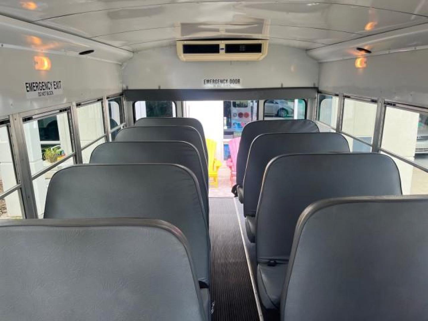 2004 Summit White /Neutral Chevrolet Express Commercial Cutaway BUS DRW LOW MILES 29,868 (1GBJG31U841) with an 6.0L Vortec 6000 V8 SFI Engine engine, Automatic transmission, located at 4701 North Dixie Hwy, Pompano Beach, FL, 33064, (954) 422-2889, 26.240938, -80.123474 - OUR WEBPAGE FLORIDACARS1.COM HAS OVER 100 PHOTOS AND FREE CARFAX LINK 2004 CHEVROLET EXPRESS G3500 IDEAL TO MAKE INTO A 5 WINDOW MINI BUS CAMPER LOTS OF OPTIONS OR LEAVE IT STOCK IF YOU NEED IT THIS WAY VIN: 1GBJG31U841216282 CUTAWAY DUAL AC ROOF REAR AIR DUALLY PERFECT 6.0L V8 F GASOLINE REAR WHEEL - Photo#16