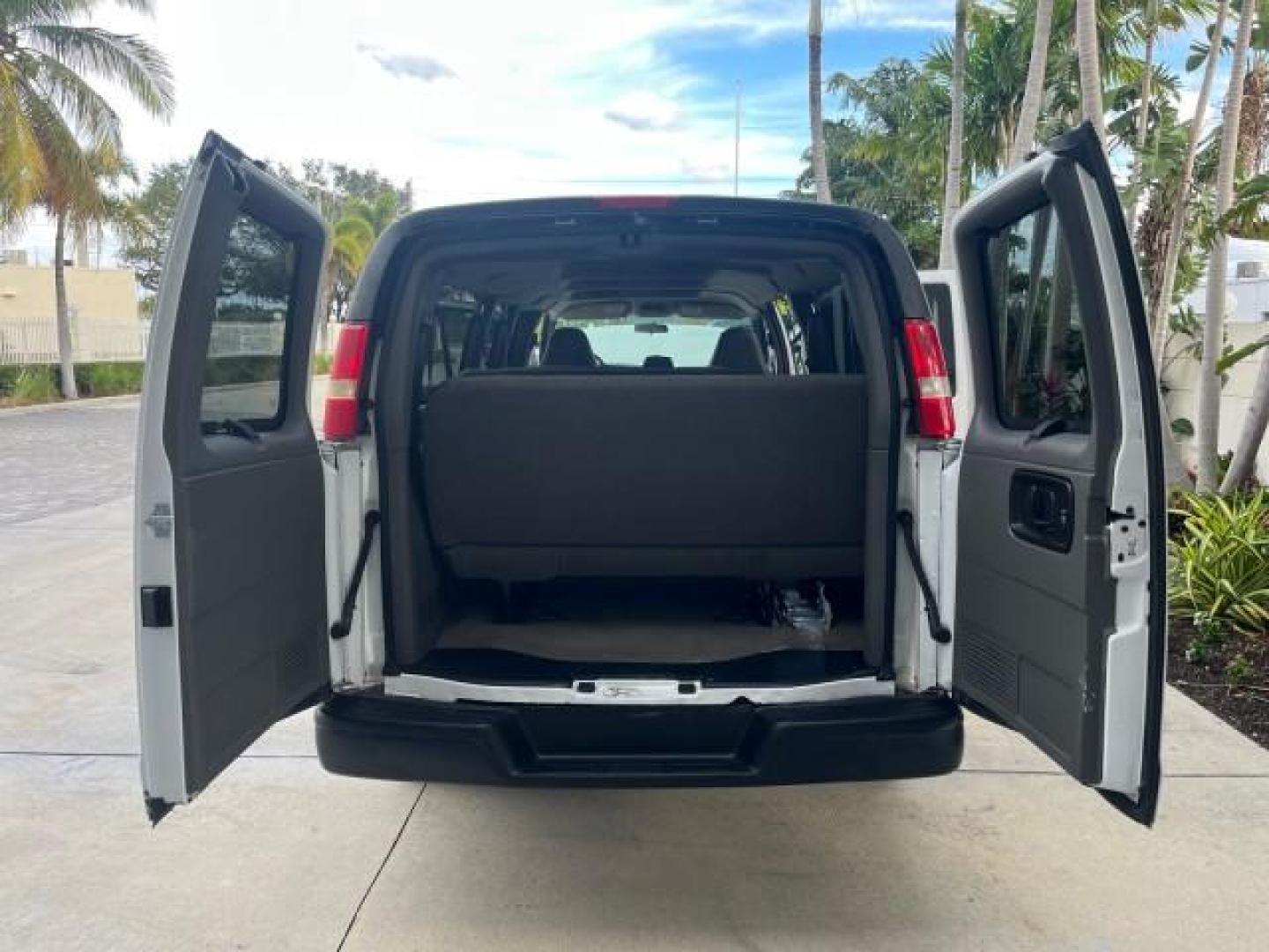 2007 Summit White /Medium Pewter Chevrolet Express 15 Passenger Van LOW MILES 33,128 (1GAHG39UX71) with an 6.0L Vortec 1000 V8 SFI Engine engine, Automatic transmission, located at 4701 North Dixie Hwy, Pompano Beach, FL, 33064, (954) 422-2889, 26.240938, -80.123474 - 2007 CHEVROLET EXPRESS LS 3500 15 PASS ROAD READY WORK READY VIN: 1GAHG39UX71130919 NO ACCIDENTS NO RECALLS VAN 13 SERVICE RECORDS 6.0L V8 F 1 OWNER 6.0L V8 15 PASSENGER GASOLINE POWER MIRRORS 4 ROW SEATS REAR WHEEL DRIVE LOW MILES 33,128 DUAL ZONE AC Active Head Restraints Anti-Theft System Auxilia - Photo#15