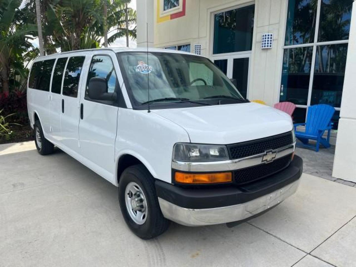 2007 Summit White /Medium Pewter Chevrolet Express 15 Passenger Van LOW MILES 33,128 (1GAHG39UX71) with an 6.0L Vortec 1000 V8 SFI Engine engine, Automatic transmission, located at 4701 North Dixie Hwy, Pompano Beach, FL, 33064, (954) 422-2889, 26.240938, -80.123474 - 2007 CHEVROLET EXPRESS LS 3500 15 PASS ROAD READY WORK READY VIN: 1GAHG39UX71130919 NO ACCIDENTS NO RECALLS VAN 13 SERVICE RECORDS 6.0L V8 F 1 OWNER 6.0L V8 15 PASSENGER GASOLINE POWER MIRRORS 4 ROW SEATS REAR WHEEL DRIVE LOW MILES 33,128 DUAL ZONE AC Active Head Restraints Anti-Theft System Auxilia - Photo#1