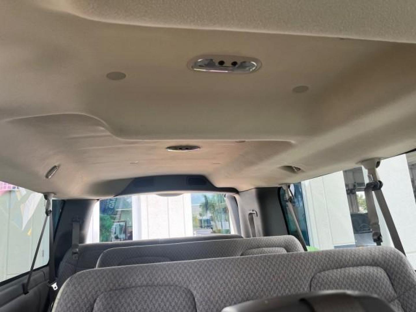 2007 Summit White /Medium Pewter Chevrolet Express 15 Passenger Van LOW MILES 33,128 (1GAHG39UX71) with an 6.0L Vortec 1000 V8 SFI Engine engine, Automatic transmission, located at 4701 North Dixie Hwy, Pompano Beach, FL, 33064, (954) 422-2889, 26.240938, -80.123474 - 2007 CHEVROLET EXPRESS LS 3500 15 PASS ROAD READY WORK READY VIN: 1GAHG39UX71130919 NO ACCIDENTS NO RECALLS VAN 13 SERVICE RECORDS 6.0L V8 F 1 OWNER 6.0L V8 15 PASSENGER GASOLINE POWER MIRRORS 4 ROW SEATS REAR WHEEL DRIVE LOW MILES 33,128 DUAL ZONE AC Active Head Restraints Anti-Theft System Auxilia - Photo#32