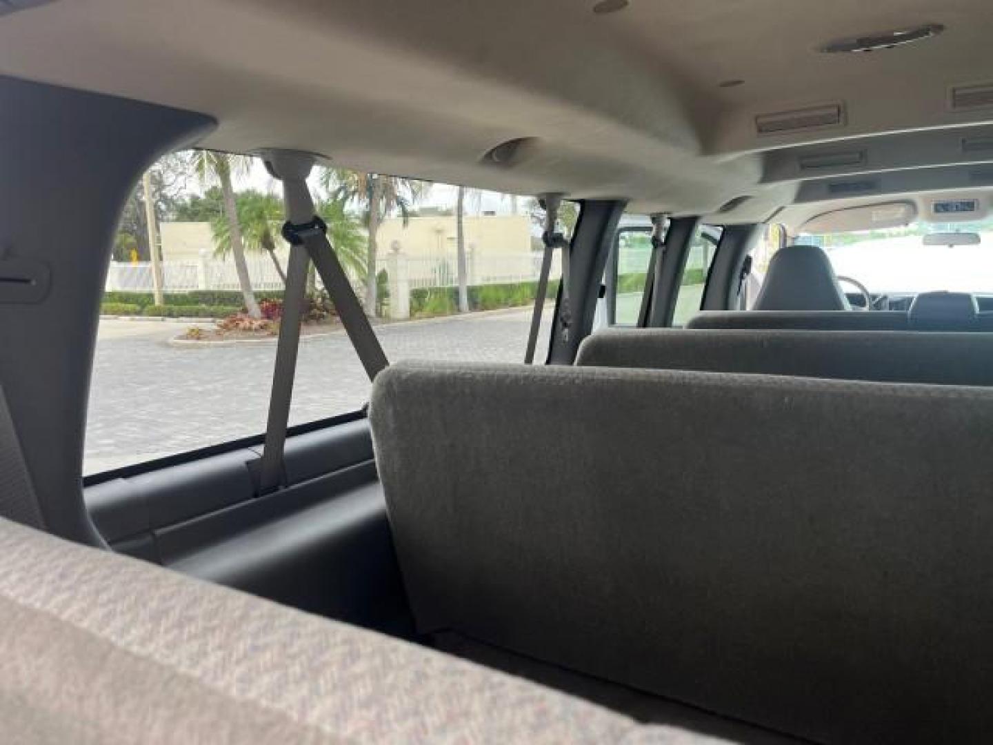 2007 Summit White /Medium Pewter Chevrolet Express 15 Passenger Van LOW MILES 33,128 (1GAHG39UX71) with an 6.0L Vortec 1000 V8 SFI Engine engine, Automatic transmission, located at 4701 North Dixie Hwy, Pompano Beach, FL, 33064, (954) 422-2889, 26.240938, -80.123474 - 2007 CHEVROLET EXPRESS LS 3500 15 PASS ROAD READY WORK READY VIN: 1GAHG39UX71130919 NO ACCIDENTS NO RECALLS VAN 13 SERVICE RECORDS 6.0L V8 F 1 OWNER 6.0L V8 15 PASSENGER GASOLINE POWER MIRRORS 4 ROW SEATS REAR WHEEL DRIVE LOW MILES 33,128 DUAL ZONE AC Active Head Restraints Anti-Theft System Auxilia - Photo#39