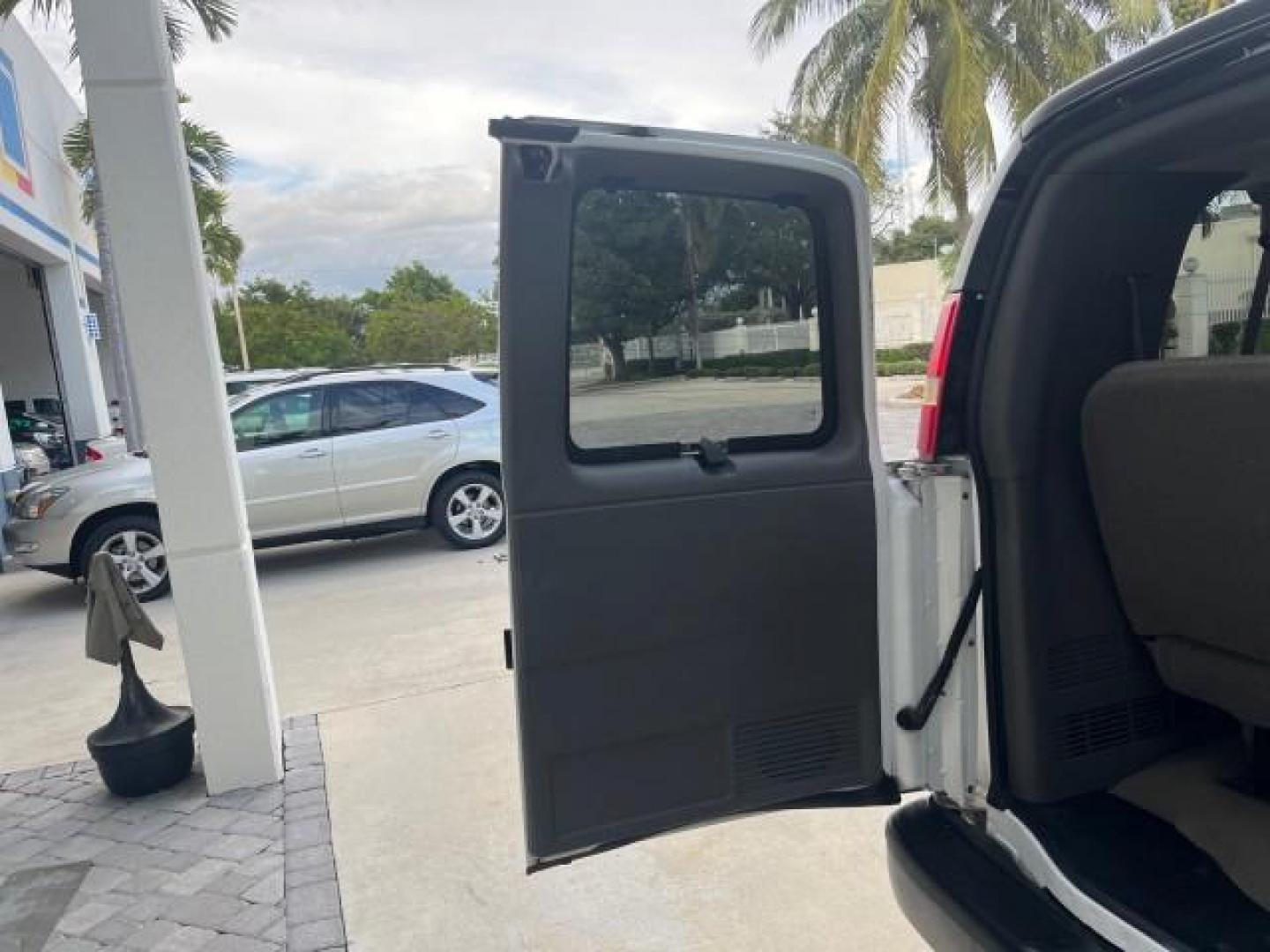 2007 Summit White /Medium Pewter Chevrolet Express 15 Passenger Van LOW MILES 33,128 (1GAHG39UX71) with an 6.0L Vortec 1000 V8 SFI Engine engine, Automatic transmission, located at 4701 North Dixie Hwy, Pompano Beach, FL, 33064, (954) 422-2889, 26.240938, -80.123474 - 2007 CHEVROLET EXPRESS LS 3500 15 PASS ROAD READY WORK READY VIN: 1GAHG39UX71130919 NO ACCIDENTS NO RECALLS VAN 13 SERVICE RECORDS 6.0L V8 F 1 OWNER 6.0L V8 15 PASSENGER GASOLINE POWER MIRRORS 4 ROW SEATS REAR WHEEL DRIVE LOW MILES 33,128 DUAL ZONE AC Active Head Restraints Anti-Theft System Auxilia - Photo#40