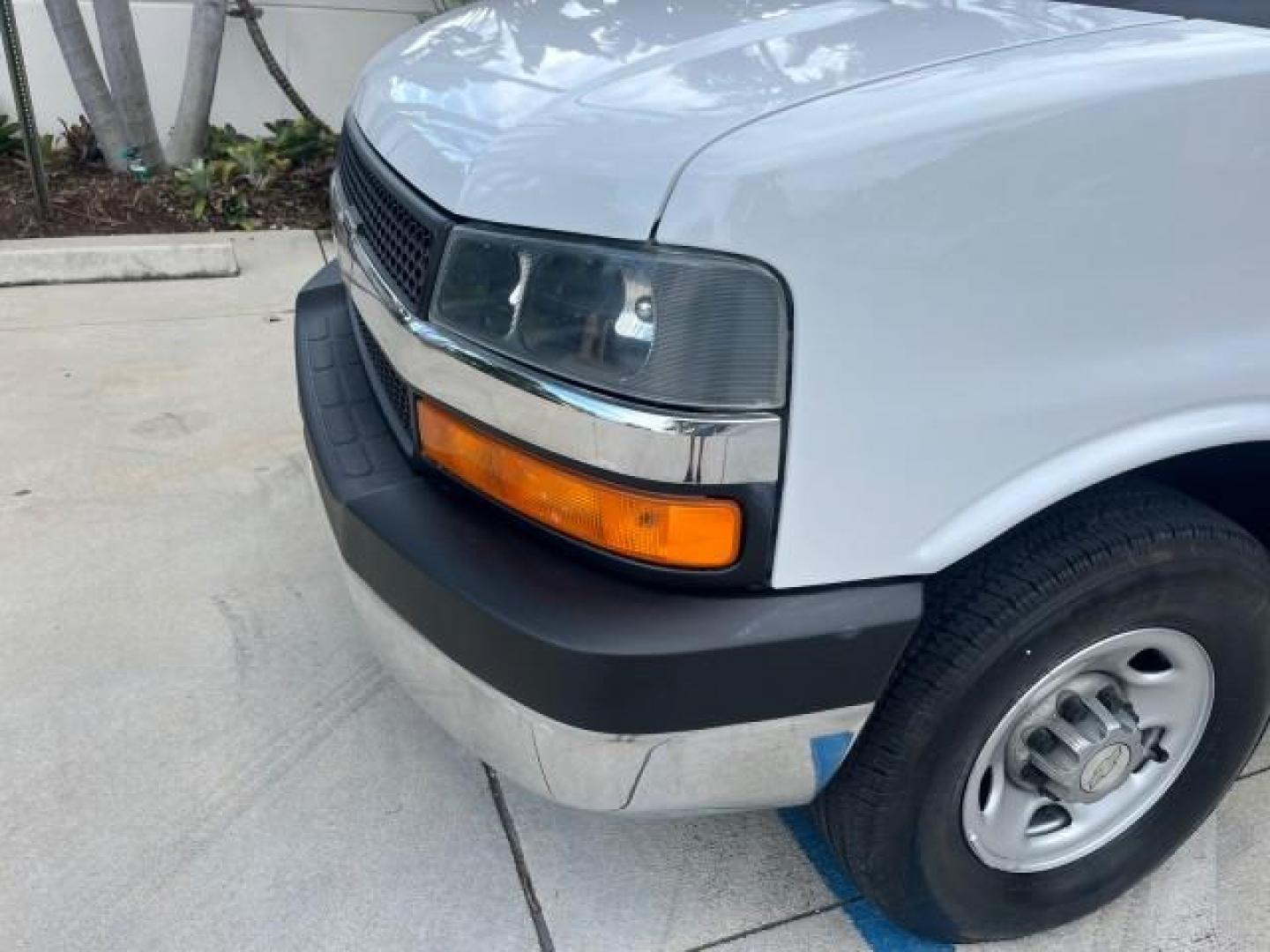 2007 Summit White /Medium Pewter Chevrolet Express 15 Passenger Van LOW MILES 33,128 (1GAHG39UX71) with an 6.0L Vortec 1000 V8 SFI Engine engine, Automatic transmission, located at 4701 North Dixie Hwy, Pompano Beach, FL, 33064, (954) 422-2889, 26.240938, -80.123474 - 2007 CHEVROLET EXPRESS LS 3500 15 PASS ROAD READY WORK READY VIN: 1GAHG39UX71130919 NO ACCIDENTS NO RECALLS VAN 13 SERVICE RECORDS 6.0L V8 F 1 OWNER 6.0L V8 15 PASSENGER GASOLINE POWER MIRRORS 4 ROW SEATS REAR WHEEL DRIVE LOW MILES 33,128 DUAL ZONE AC Active Head Restraints Anti-Theft System Auxilia - Photo#69