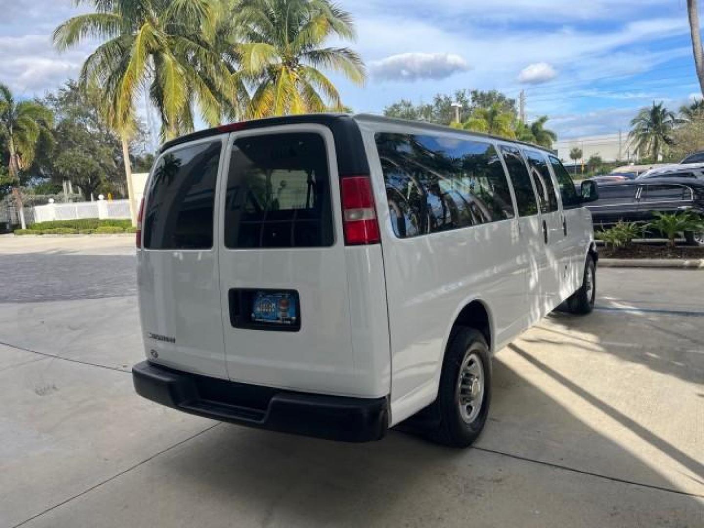 2007 Summit White /Medium Pewter Chevrolet Express 15 Passenger Van LOW MILES 33,128 (1GAHG39UX71) with an 6.0L Vortec 1000 V8 SFI Engine engine, Automatic transmission, located at 4701 North Dixie Hwy, Pompano Beach, FL, 33064, (954) 422-2889, 26.240938, -80.123474 - 2007 CHEVROLET EXPRESS LS 3500 15 PASS ROAD READY WORK READY VIN: 1GAHG39UX71130919 NO ACCIDENTS NO RECALLS VAN 13 SERVICE RECORDS 6.0L V8 F 1 OWNER 6.0L V8 15 PASSENGER GASOLINE POWER MIRRORS 4 ROW SEATS REAR WHEEL DRIVE LOW MILES 33,128 DUAL ZONE AC Active Head Restraints Anti-Theft System Auxilia - Photo#7