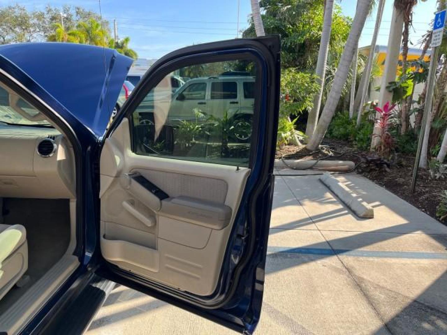 2006 Dark Blue Pearl Metallic /Camel Ford Explorer 4x4 XLT LOW MILES 65,875 (1FMEU73E66U) with an 4.0L SOHC V6 Engine engine, Automatic transmission, located at 4701 North Dixie Hwy, Pompano Beach, FL, 33064, (954) 422-2889, 26.240938, -80.123474 - 2006 FORD EXPLORER XLT NEW $ 36,450 ROAD READY VIN: 1FMEU73E66UA13889 LOW MILES 65,875 4.0L V6 4 DOOR WAGON/SPORT UTILITY 1 OWNER FLORIDA 4X4 4.0L V6 F SOHC 4WD ON DEMAND DVD GASOLINE NO ACCIDENTS SUNROOF REAR WHEEL DRIVE W/ 4X4 3 ROW SEATS XLT 4WD Anti-Theft System Approach Lights Black Roof Rack C - Photo#11