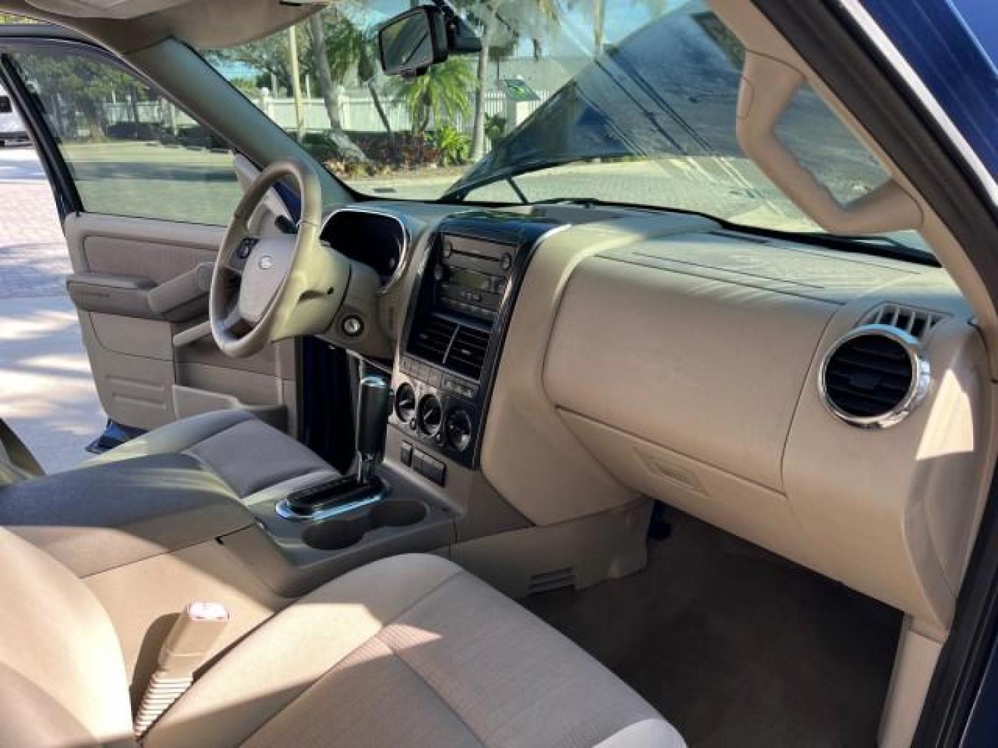 2006 Dark Blue Pearl Metallic /Camel Ford Explorer 4x4 XLT LOW MILES 65,875 (1FMEU73E66U) with an 4.0L SOHC V6 Engine engine, Automatic transmission, located at 4701 North Dixie Hwy, Pompano Beach, FL, 33064, (954) 422-2889, 26.240938, -80.123474 - 2006 FORD EXPLORER XLT NEW $ 36,450 ROAD READY VIN: 1FMEU73E66UA13889 LOW MILES 65,875 4.0L V6 4 DOOR WAGON/SPORT UTILITY 1 OWNER FLORIDA 4X4 4.0L V6 F SOHC 4WD ON DEMAND DVD GASOLINE NO ACCIDENTS SUNROOF REAR WHEEL DRIVE W/ 4X4 3 ROW SEATS XLT 4WD Anti-Theft System Approach Lights Black Roof Rack C - Photo#25