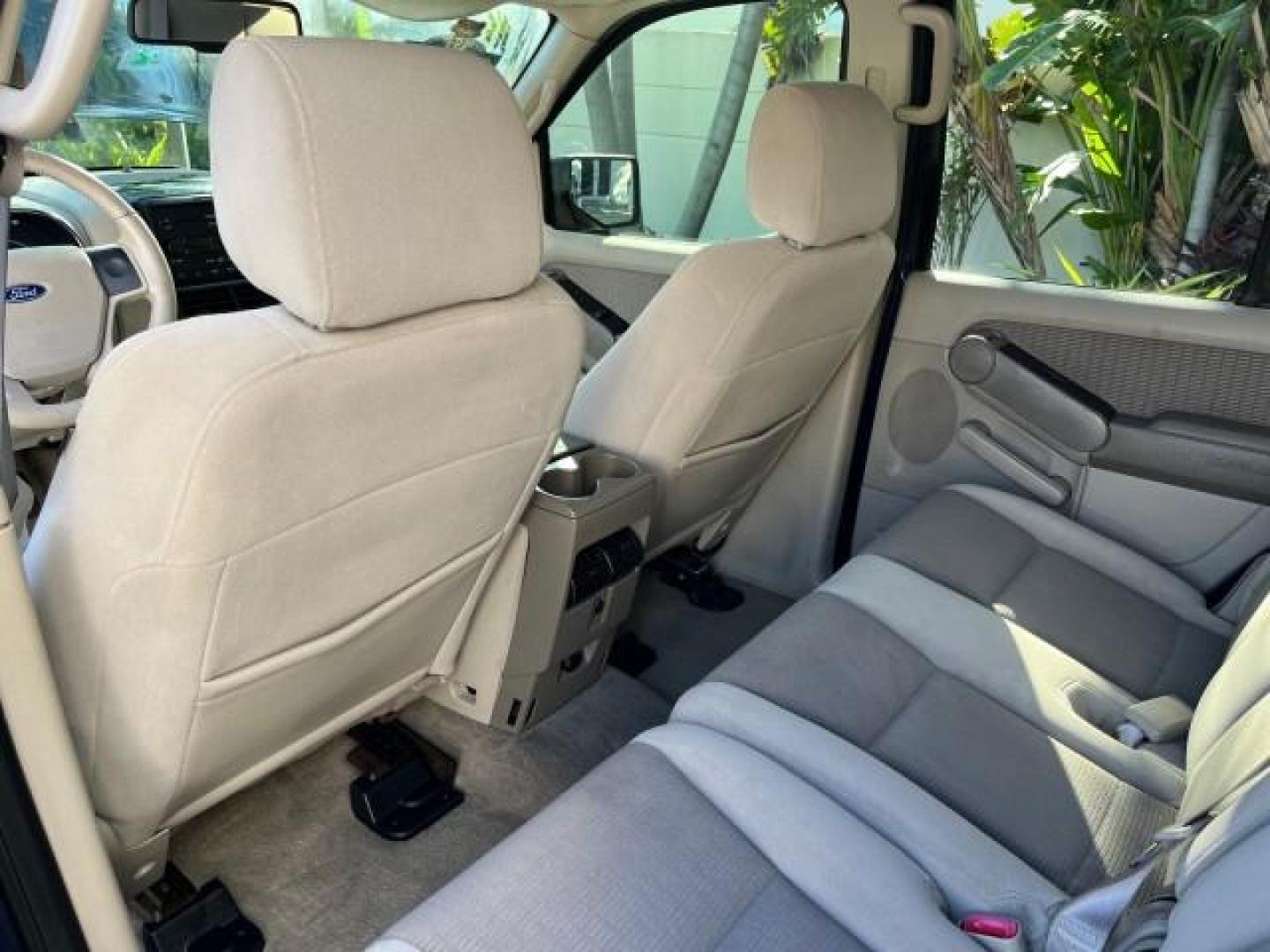 2006 Dark Blue Pearl Metallic /Camel Ford Explorer 4x4 XLT LOW MILES 65,875 (1FMEU73E66U) with an 4.0L SOHC V6 Engine engine, Automatic transmission, located at 4701 North Dixie Hwy, Pompano Beach, FL, 33064, (954) 422-2889, 26.240938, -80.123474 - 2006 FORD EXPLORER XLT NEW $ 36,450 ROAD READY VIN: 1FMEU73E66UA13889 LOW MILES 65,875 4.0L V6 4 DOOR WAGON/SPORT UTILITY 1 OWNER FLORIDA 4X4 4.0L V6 F SOHC 4WD ON DEMAND DVD GASOLINE NO ACCIDENTS SUNROOF REAR WHEEL DRIVE W/ 4X4 3 ROW SEATS XLT 4WD Anti-Theft System Approach Lights Black Roof Rack C - Photo#36