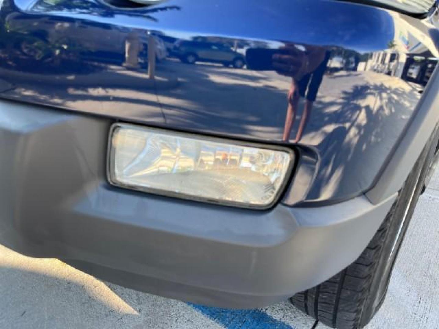 2006 Dark Blue Pearl Metallic /Camel Ford Explorer 4x4 XLT LOW MILES 65,875 (1FMEU73E66U) with an 4.0L SOHC V6 Engine engine, Automatic transmission, located at 4701 North Dixie Hwy, Pompano Beach, FL, 33064, (954) 422-2889, 26.240938, -80.123474 - 2006 FORD EXPLORER XLT NEW $ 36,450 ROAD READY VIN: 1FMEU73E66UA13889 LOW MILES 65,875 4.0L V6 4 DOOR WAGON/SPORT UTILITY 1 OWNER FLORIDA 4X4 4.0L V6 F SOHC 4WD ON DEMAND DVD GASOLINE NO ACCIDENTS SUNROOF REAR WHEEL DRIVE W/ 4X4 3 ROW SEATS XLT 4WD Anti-Theft System Approach Lights Black Roof Rack C - Photo#79