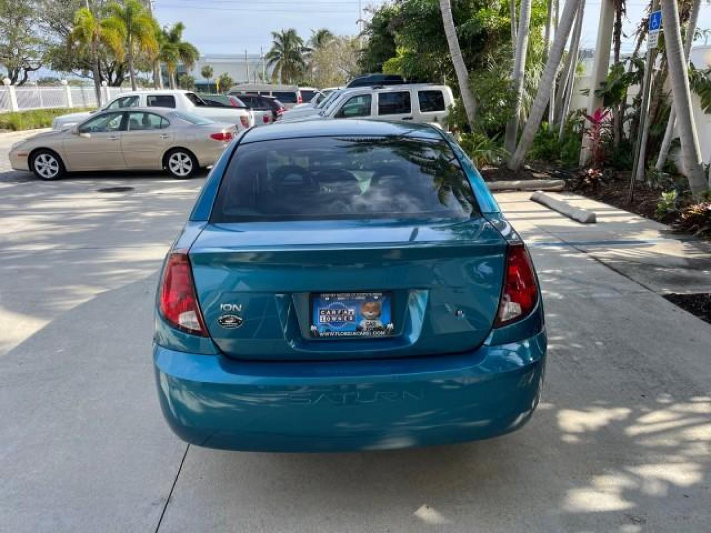 2005 Dragonfly Green /Tan Saturn Ion 1 FL ION 2 LOW MILES 50,692 (1G8AJ52F45Z) with an 2.2L DOHC SFI 16-Valve I4 Ecotec Engine engine, Automatic transmission, located at 4701 North Dixie Hwy, Pompano Beach, FL, 33064, (954) 422-2889, 26.240938, -80.123474 - 2005 SATURN ION 2 NEW $ 26,765 ROAD READY VIN: 1G8AJ52F45Z153588 NO RECALLS 32 MPG SEDAN 4 DR 1 OWNER FLORIDA 2.2L I4 F LOW MILES 50,692 GASOLINE 11 SERVICE RECORDS FRONT WHEEL DRIVE POWER MIRRORS/WINDOWS AM/FM Stereo Air Conditioning Automatic Transmission CD Audio Cloth Seats Cruise Control Power - Photo#6