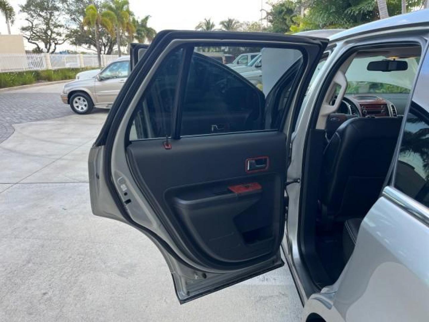 2008 Blazing Copper Metallic /Medium Light Stone Ford Edge Limited LOW MILES 32,223 (2FMDK39C38B) with an 3.5L V6 Duratec Engine engine, Automatic transmission, located at 4701 North Dixie Hwy, Pompano Beach, FL, 33064, (954) 422-2889, 26.240938, -80.123474 - 2008 FORD EDGE LIMITED ROAD READY LIMITED VIN: 2FMDK39C38BB08855 POWER LIFTGATE NO ACCIDENTS 4 DOOR WAGON/SPORT UTILITY PARKING SENSORS FLORIDA OWNER 3.5L V6 F DUAL ZONE AC PANORAMIC SUNROOF GASOLINE POWER HEATED MIRRORS LOW MILES 32,223 FRONT WHEEL DRIVE POWER HEATED SEATS 9 SERVICE RECORDS Alloy S - Photo#13