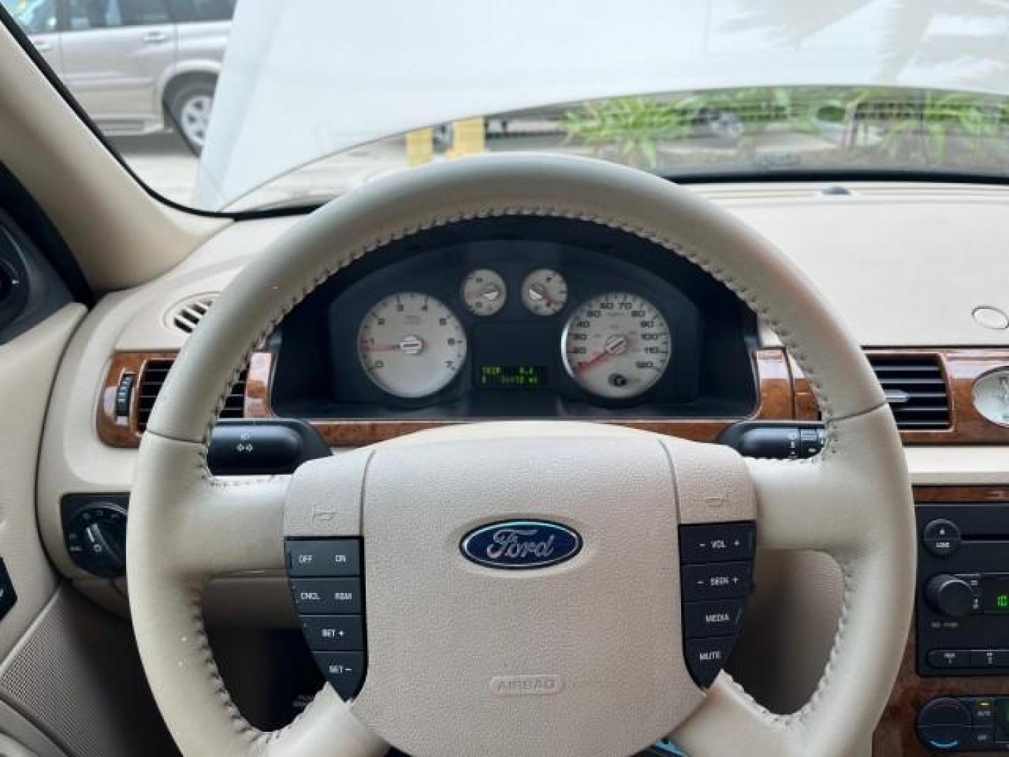 2005 Pueblo Gold Metallic /Pebble Tan Ford Five Hundred 1 FL Limited LOW MILES 36,412 (1FAHP25165G) with an 3.0L DOHC SMPI 24-Valve V6 Duratec Engine engine, Automatic transmission, located at 4701 North Dixie Hwy, Pompano Beach, FL, 33064, (954) 422-2889, 26.240938, -80.123474 - 2005 FORD FIVE HUNDRED LIMITED NEW $ 27,125 ROAD READY VIN: 1FAHP25165G185090 SUNROOF NO ACCIDENTS NO RECALLS SEDAN 4 DR LIMITED 1 OWNER FLORIDA 29 MPG 3.0L V6 F PARK SENSORS POWER HEATED LEATHER SEATS GASOLINE DUAL ZONE AC POWER HEATED MIRRORS FRONT WHEEL DRIVE LOW MILES 36,412 14 SERVICE RECORDS A - Photo#58