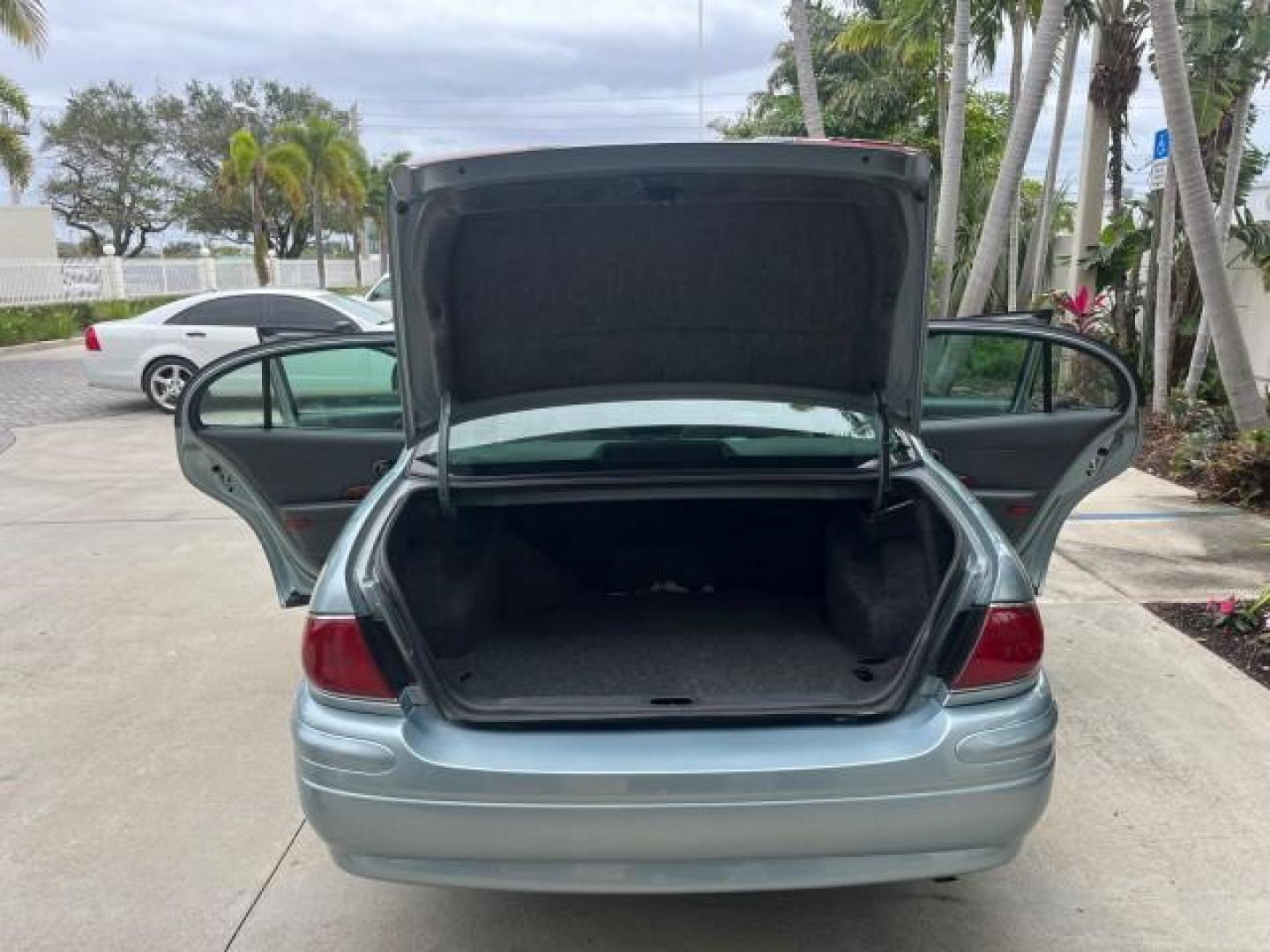 2003 Silver Blue Ice Metallic /Medium Gray Buick LeSabre Custom LOW MILES 38,040 (1G4HP52K434) with an 3.8L 3800 V6 SFI Engine engine, Automatic transmission, located at 4701 North Dixie Hwy, Pompano Beach, FL, 33064, (954) 422-2889, 26.240938, -80.123474 - 2003 BUICK LESABRE CUSTOM ROAD READY 3.8L V6 CUSTOM VIN: 1G4HP52K434132200 NO ACCIDENTS NO RECALLS SEDAN 4 DR FLORIDA OWNER 28 MPG 3.8L V6 F 12V LOW MILES 38,040 ACTUAL GASOLINE 17 SERVICE RECORDS FRONT WHEEL DRIVE POWER SEATS POWER MIRRORS ABS Brakes AM/FM Stereo Air Conditioning Automatic Transmis - Photo#15