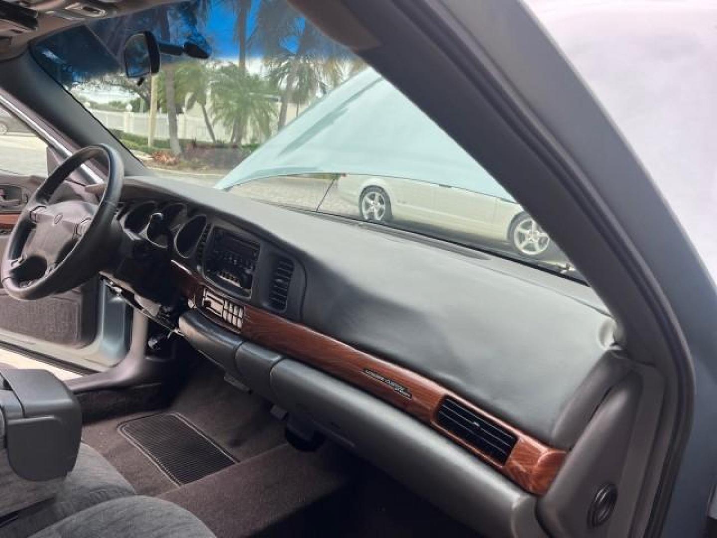 2003 Silver Blue Ice Metallic /Medium Gray Buick LeSabre Custom LOW MILES 38,040 (1G4HP52K434) with an 3.8L 3800 V6 SFI Engine engine, Automatic transmission, located at 4701 North Dixie Hwy, Pompano Beach, FL, 33064, (954) 422-2889, 26.240938, -80.123474 - 2003 BUICK LESABRE CUSTOM ROAD READY 3.8L V6 CUSTOM VIN: 1G4HP52K434132200 NO ACCIDENTS NO RECALLS SEDAN 4 DR FLORIDA OWNER 28 MPG 3.8L V6 F 12V LOW MILES 38,040 ACTUAL GASOLINE 17 SERVICE RECORDS FRONT WHEEL DRIVE POWER SEATS POWER MIRRORS ABS Brakes AM/FM Stereo Air Conditioning Automatic Transmis - Photo#25