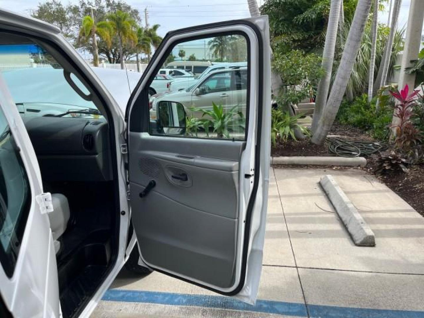 2005 Oxford White /Medium Flint Ford Econoline Cargo Van LOW MILES 57,376 (1FTRE14W25H) with an 4.6L SOHC EFI V8 Triton Engine engine, Automatic transmission, located at 4701 North Dixie Hwy, Pompano Beach, FL, 33064, (954) 422-2889, 26.240938, -80.123474 - OUR WEBPAGE FLORIDACARS1.COM HAS OVER 100 PHOTOS AND FREE CARFAX LINK 2005 FORD E-SERIES E-150 CARGO VAN NO RECALLS VIN: 1FTRE14W25HA67107 WORK READY VAN ROAD READY 4.6L V8 F SOHC LOW MILES 57,376 GASOLINE 4.6L V8 REAR WHEEL DRIVE 6 SERVICE RECORDS Automatic Climate Control Front Bucket Seats RWD TH - Photo#11