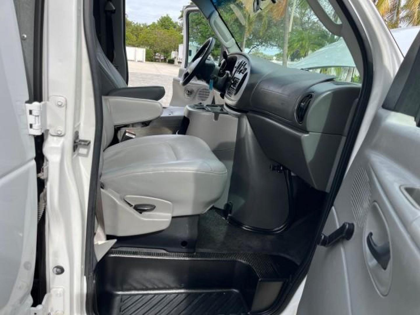 2005 Oxford White /Medium Flint Ford Econoline Cargo Van LOW MILES 57,376 (1FTRE14W25H) with an 4.6L SOHC EFI V8 Triton Engine engine, Automatic transmission, located at 4701 North Dixie Hwy, Pompano Beach, FL, 33064, (954) 422-2889, 26.240938, -80.123474 - OUR WEBPAGE FLORIDACARS1.COM HAS OVER 100 PHOTOS AND FREE CARFAX LINK 2005 FORD E-SERIES E-150 CARGO VAN NO RECALLS VIN: 1FTRE14W25HA67107 WORK READY VAN ROAD READY 4.6L V8 F SOHC LOW MILES 57,376 GASOLINE 4.6L V8 REAR WHEEL DRIVE 6 SERVICE RECORDS Automatic Climate Control Front Bucket Seats RWD TH - Photo#12