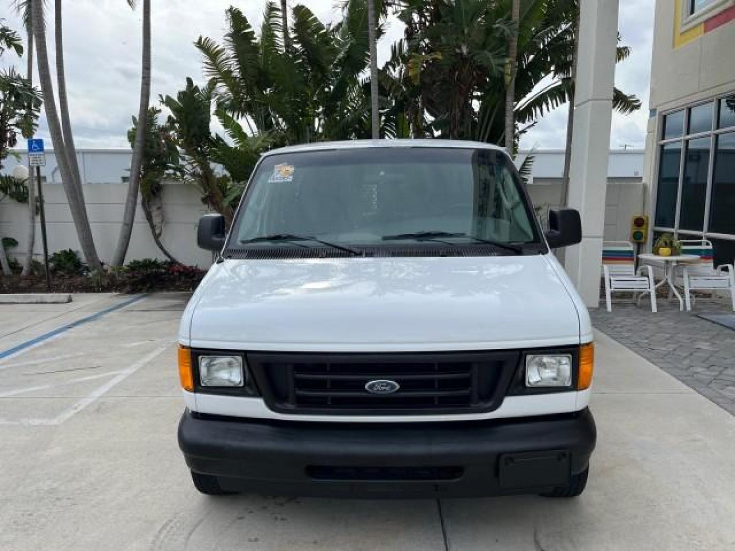 2005 Oxford White /Medium Flint Ford Econoline Cargo Van LOW MILES 57,376 (1FTRE14W25H) with an 4.6L SOHC EFI V8 Triton Engine engine, Automatic transmission, located at 4701 North Dixie Hwy, Pompano Beach, FL, 33064, (954) 422-2889, 26.240938, -80.123474 - OUR WEBPAGE FLORIDACARS1.COM HAS OVER 100 PHOTOS AND FREE CARFAX LINK 2005 FORD E-SERIES E-150 CARGO VAN NO RECALLS VIN: 1FTRE14W25HA67107 WORK READY VAN ROAD READY 4.6L V8 F SOHC LOW MILES 57,376 GASOLINE 4.6L V8 REAR WHEEL DRIVE 6 SERVICE RECORDS Automatic Climate Control Front Bucket Seats RWD TH - Photo#2