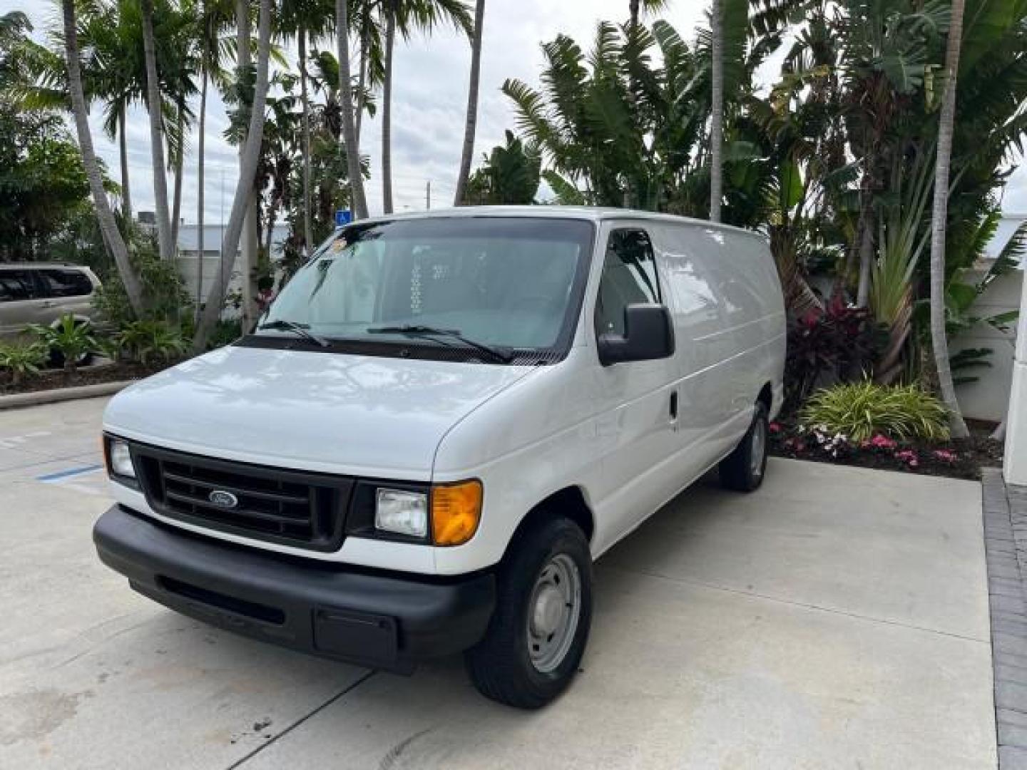 2005 Oxford White /Medium Flint Ford Econoline Cargo Van LOW MILES 57,376 (1FTRE14W25H) with an 4.6L SOHC EFI V8 Triton Engine engine, Automatic transmission, located at 4701 North Dixie Hwy, Pompano Beach, FL, 33064, (954) 422-2889, 26.240938, -80.123474 - OUR WEBPAGE FLORIDACARS1.COM HAS OVER 100 PHOTOS AND FREE CARFAX LINK 2005 FORD E-SERIES E-150 CARGO VAN NO RECALLS VIN: 1FTRE14W25HA67107 WORK READY VAN ROAD READY 4.6L V8 F SOHC LOW MILES 57,376 GASOLINE 4.6L V8 REAR WHEEL DRIVE 6 SERVICE RECORDS Automatic Climate Control Front Bucket Seats RWD TH - Photo#3