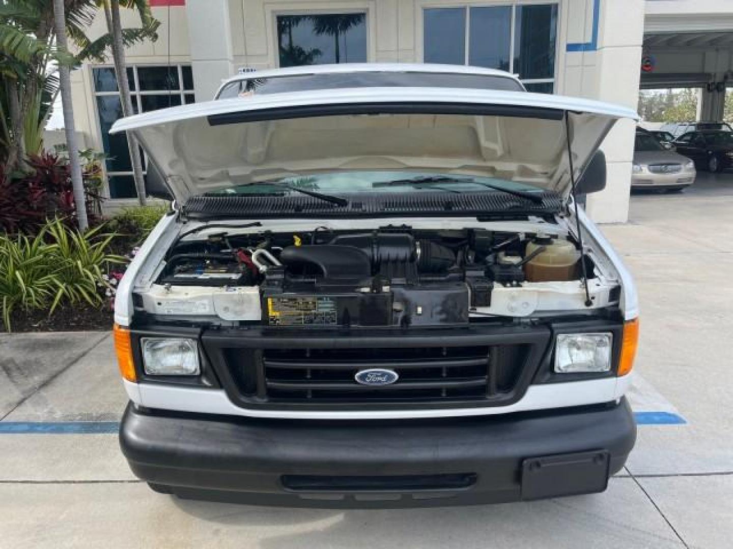 2005 Oxford White /Medium Flint Ford Econoline Cargo Van LOW MILES 57,376 (1FTRE14W25H) with an 4.6L SOHC EFI V8 Triton Engine engine, Automatic transmission, located at 4701 North Dixie Hwy, Pompano Beach, FL, 33064, (954) 422-2889, 26.240938, -80.123474 - OUR WEBPAGE FLORIDACARS1.COM HAS OVER 100 PHOTOS AND FREE CARFAX LINK 2005 FORD E-SERIES E-150 CARGO VAN NO RECALLS VIN: 1FTRE14W25HA67107 WORK READY VAN ROAD READY 4.6L V8 F SOHC LOW MILES 57,376 GASOLINE 4.6L V8 REAR WHEEL DRIVE 6 SERVICE RECORDS Automatic Climate Control Front Bucket Seats RWD TH - Photo#43