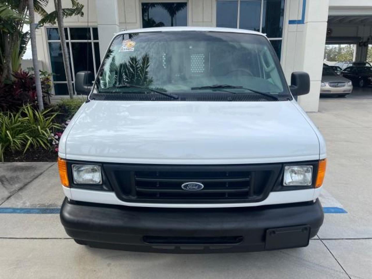 2005 Oxford White /Medium Flint Ford Econoline Cargo Van LOW MILES 57,376 (1FTRE14W25H) with an 4.6L SOHC EFI V8 Triton Engine engine, Automatic transmission, located at 4701 North Dixie Hwy, Pompano Beach, FL, 33064, (954) 422-2889, 26.240938, -80.123474 - OUR WEBPAGE FLORIDACARS1.COM HAS OVER 100 PHOTOS AND FREE CARFAX LINK 2005 FORD E-SERIES E-150 CARGO VAN NO RECALLS VIN: 1FTRE14W25HA67107 WORK READY VAN ROAD READY 4.6L V8 F SOHC LOW MILES 57,376 GASOLINE 4.6L V8 REAR WHEEL DRIVE 6 SERVICE RECORDS Automatic Climate Control Front Bucket Seats RWD TH - Photo#47