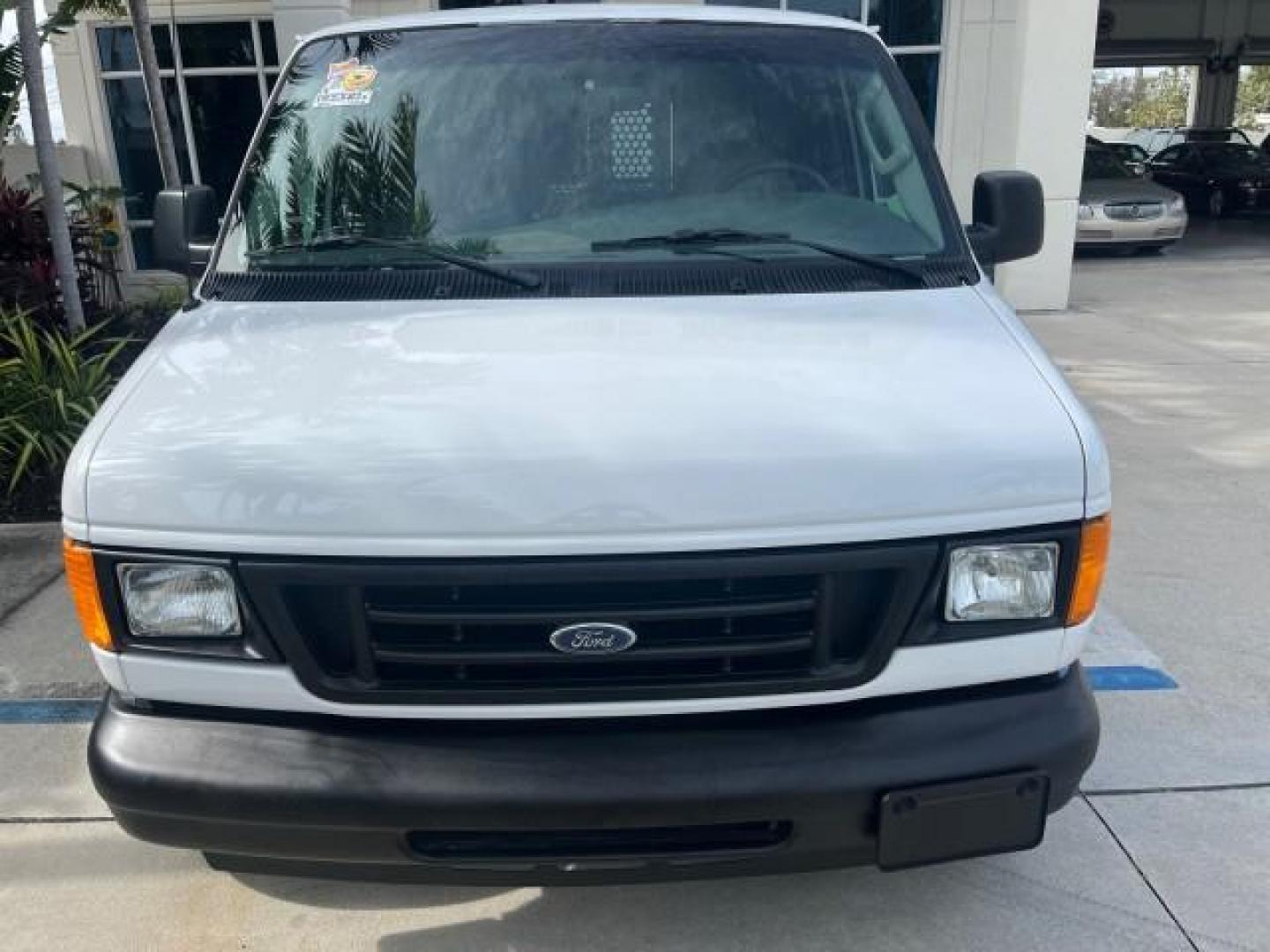 2005 Oxford White /Medium Flint Ford Econoline Cargo Van LOW MILES 57,376 (1FTRE14W25H) with an 4.6L SOHC EFI V8 Triton Engine engine, Automatic transmission, located at 4701 North Dixie Hwy, Pompano Beach, FL, 33064, (954) 422-2889, 26.240938, -80.123474 - OUR WEBPAGE FLORIDACARS1.COM HAS OVER 100 PHOTOS AND FREE CARFAX LINK 2005 FORD E-SERIES E-150 CARGO VAN NO RECALLS VIN: 1FTRE14W25HA67107 WORK READY VAN ROAD READY 4.6L V8 F SOHC LOW MILES 57,376 GASOLINE 4.6L V8 REAR WHEEL DRIVE 6 SERVICE RECORDS Automatic Climate Control Front Bucket Seats RWD TH - Photo#65