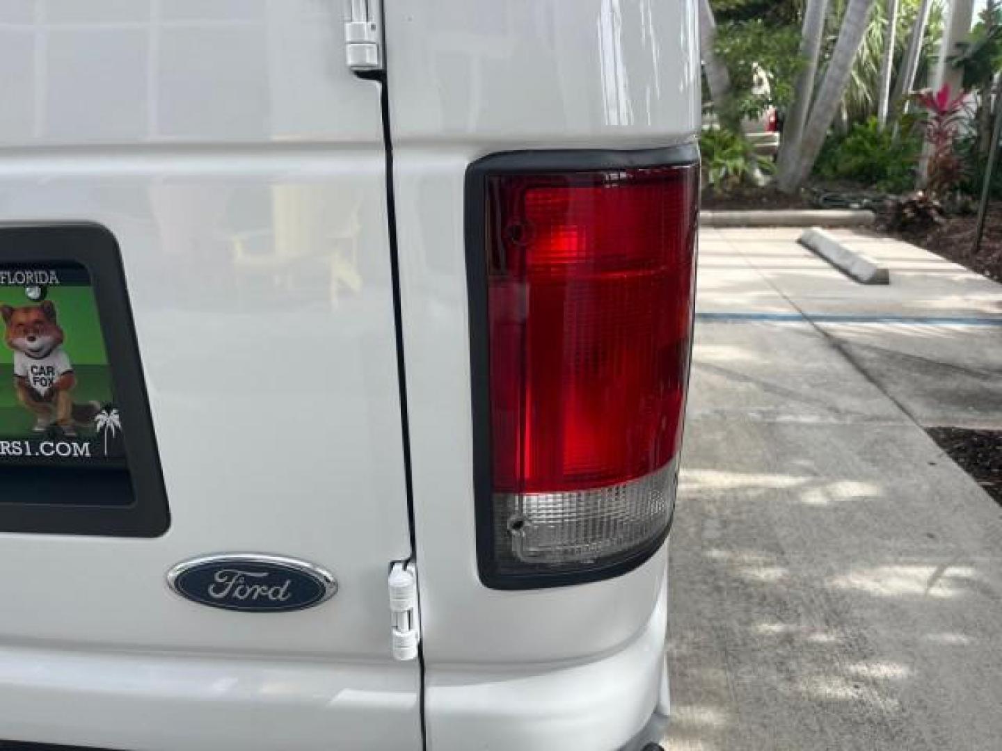 2005 Oxford White /Medium Flint Ford Econoline Cargo Van LOW MILES 57,376 (1FTRE14W25H) with an 4.6L SOHC EFI V8 Triton Engine engine, Automatic transmission, located at 4701 North Dixie Hwy, Pompano Beach, FL, 33064, (954) 422-2889, 26.240938, -80.123474 - OUR WEBPAGE FLORIDACARS1.COM HAS OVER 100 PHOTOS AND FREE CARFAX LINK 2005 FORD E-SERIES E-150 CARGO VAN NO RECALLS VIN: 1FTRE14W25HA67107 WORK READY VAN ROAD READY 4.6L V8 F SOHC LOW MILES 57,376 GASOLINE 4.6L V8 REAR WHEEL DRIVE 6 SERVICE RECORDS Automatic Climate Control Front Bucket Seats RWD TH - Photo#70