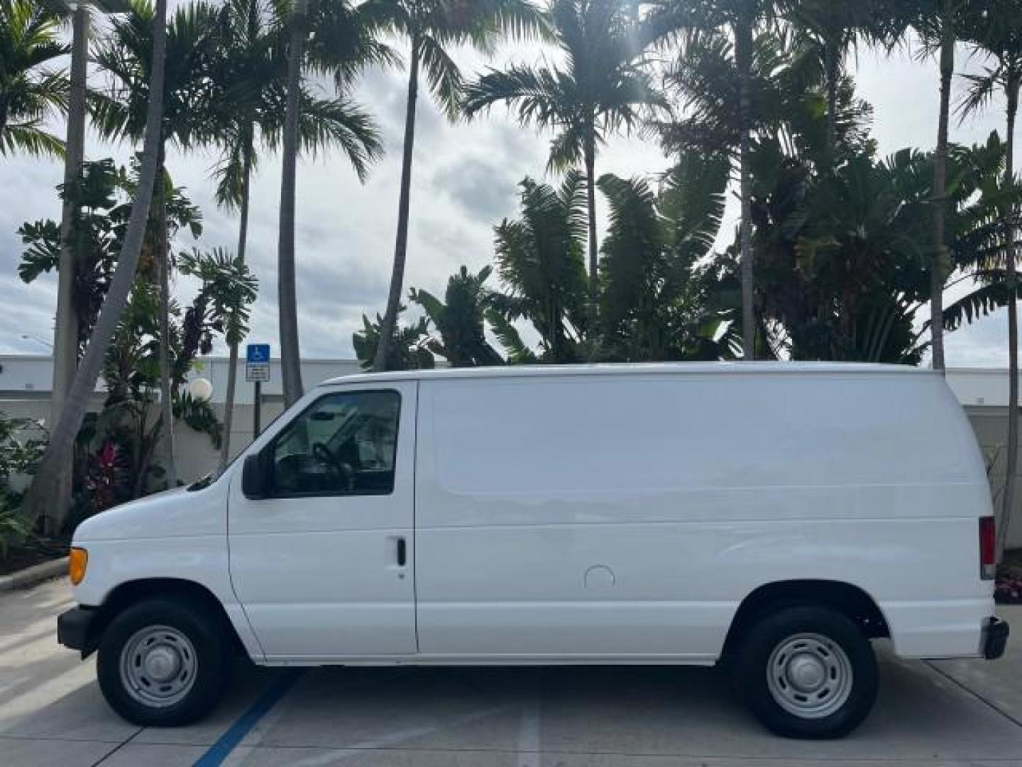 2005 Oxford White /Medium Flint Ford Econoline Cargo Van LOW MILES 57,376 (1FTRE14W25H) with an 4.6L SOHC EFI V8 Triton Engine engine, Automatic transmission, located at 4701 North Dixie Hwy, Pompano Beach, FL, 33064, (954) 422-2889, 26.240938, -80.123474 - OUR WEBPAGE FLORIDACARS1.COM HAS OVER 100 PHOTOS AND FREE CARFAX LINK 2005 FORD E-SERIES E-150 CARGO VAN NO RECALLS VIN: 1FTRE14W25HA67107 WORK READY VAN ROAD READY 4.6L V8 F SOHC LOW MILES 57,376 GASOLINE 4.6L V8 REAR WHEEL DRIVE 6 SERVICE RECORDS Automatic Climate Control Front Bucket Seats RWD TH - Photo#74