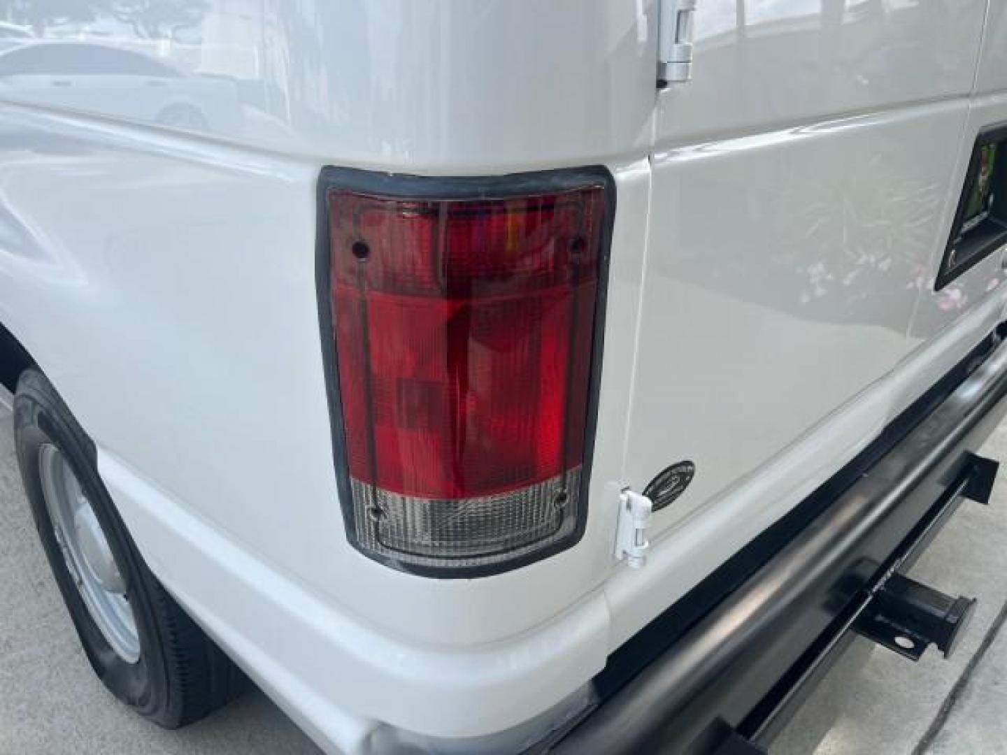 2005 Oxford White /Medium Flint Ford Econoline Cargo Van LOW MILES 57,376 (1FTRE14W25H) with an 4.6L SOHC EFI V8 Triton Engine engine, Automatic transmission, located at 4701 North Dixie Hwy, Pompano Beach, FL, 33064, (954) 422-2889, 26.240938, -80.123474 - OUR WEBPAGE FLORIDACARS1.COM HAS OVER 100 PHOTOS AND FREE CARFAX LINK 2005 FORD E-SERIES E-150 CARGO VAN NO RECALLS VIN: 1FTRE14W25HA67107 WORK READY VAN ROAD READY 4.6L V8 F SOHC LOW MILES 57,376 GASOLINE 4.6L V8 REAR WHEEL DRIVE 6 SERVICE RECORDS Automatic Climate Control Front Bucket Seats RWD TH - Photo#78