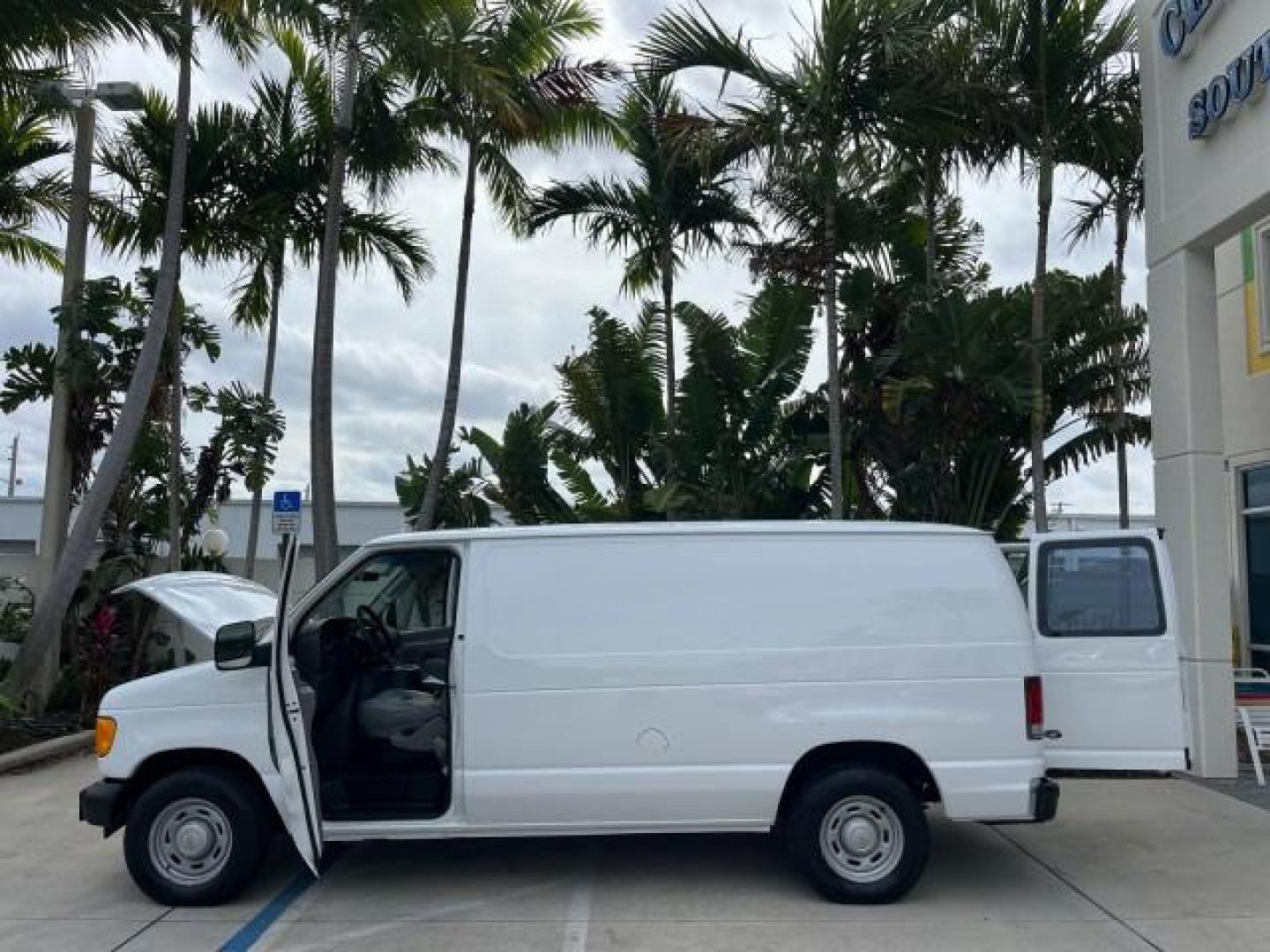 2005 Oxford White /Medium Flint Ford Econoline Cargo Van LOW MILES 57,376 (1FTRE14W25H) with an 4.6L SOHC EFI V8 Triton Engine engine, Automatic transmission, located at 4701 North Dixie Hwy, Pompano Beach, FL, 33064, (954) 422-2889, 26.240938, -80.123474 - OUR WEBPAGE FLORIDACARS1.COM HAS OVER 100 PHOTOS AND FREE CARFAX LINK 2005 FORD E-SERIES E-150 CARGO VAN NO RECALLS VIN: 1FTRE14W25HA67107 WORK READY VAN ROAD READY 4.6L V8 F SOHC LOW MILES 57,376 GASOLINE 4.6L V8 REAR WHEEL DRIVE 6 SERVICE RECORDS Automatic Climate Control Front Bucket Seats RWD TH - Photo#8