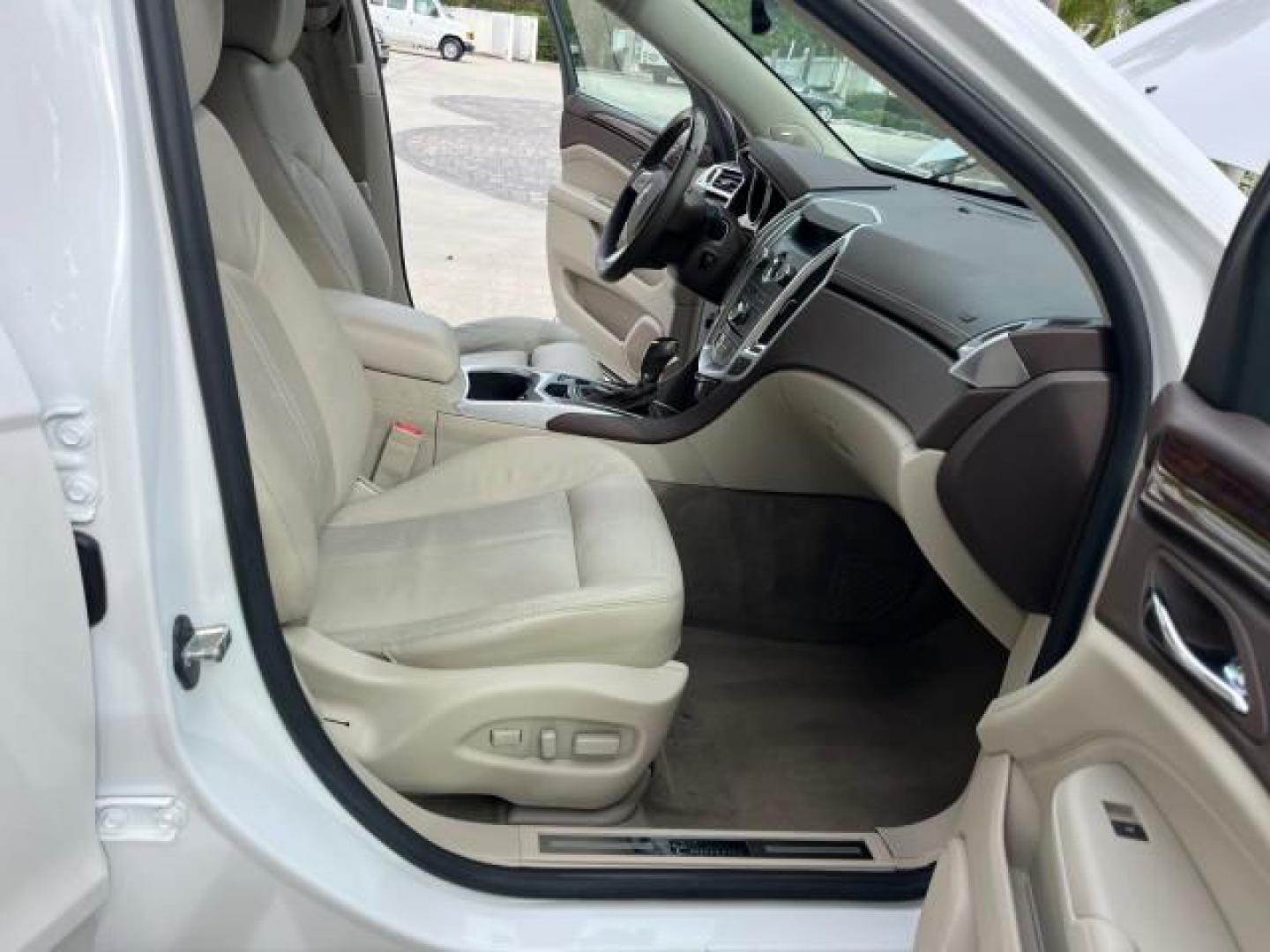 2011 Platinum Ice Tricoat /Shale w/Ebony accents Cadillac SRX Performance Collection LOW MILES 58,331 (3GYFNBEY9BS) with an 3.0L VVT DOHC V6 SIDI Engine engine, Automatic transmission, located at 4701 North Dixie Hwy, Pompano Beach, FL, 33064, (954) 422-2889, 26.240938, -80.123474 - 2011 CADILLAC SRX PERFORMANCE COLLECTION ROAD READY NAVIGATION VIN: 3GYFNBEY9BS513906 BOSE AUDIO PANORAMIC SUNROOF 4 DOOR WAGON/SPORT UTILITY NEW $ 44,085 BACK UP CAMERA/SENSORS 3.0L V6 F DOHC 24V DUAL AC NO ACCIDENTS NO RECALLS GASOLINE LEATHER BLUETOOTH BRAKING ASSIST FRONT WHEEL DRIVE PUSH START - Photo#12