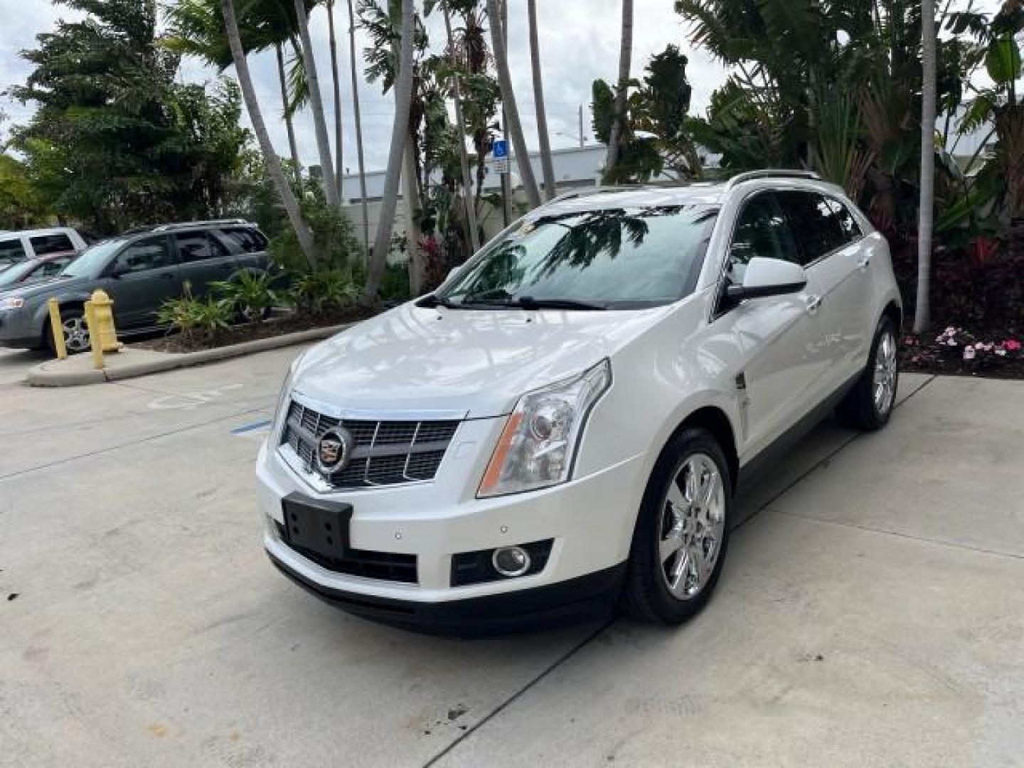 2011 Platinum Ice Tricoat /Shale w/Ebony accents Cadillac SRX Performance Collection LOW MILES 58,331 (3GYFNBEY9BS) with an 3.0L VVT DOHC V6 SIDI Engine engine, Automatic transmission, located at 4701 North Dixie Hwy, Pompano Beach, FL, 33064, (954) 422-2889, 26.240938, -80.123474 - 2011 CADILLAC SRX PERFORMANCE COLLECTION ROAD READY NAVIGATION VIN: 3GYFNBEY9BS513906 BOSE AUDIO PANORAMIC SUNROOF 4 DOOR WAGON/SPORT UTILITY NEW $ 44,085 BACK UP CAMERA/SENSORS 3.0L V6 F DOHC 24V DUAL AC NO ACCIDENTS NO RECALLS GASOLINE LEATHER BLUETOOTH BRAKING ASSIST FRONT WHEEL DRIVE PUSH START - Photo#3