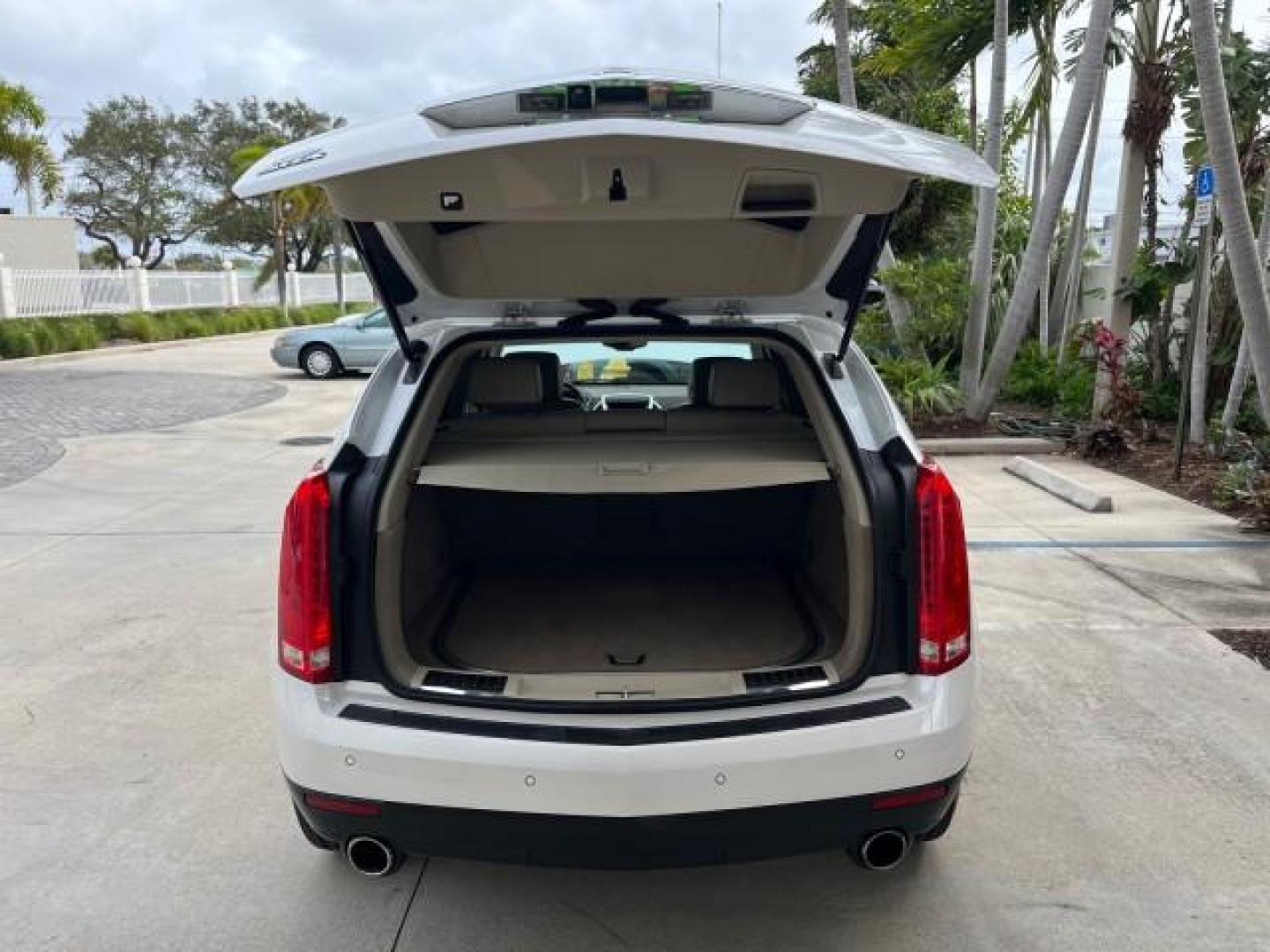 2011 Platinum Ice Tricoat /Shale w/Ebony accents Cadillac SRX Performance Collection LOW MILES 58,331 (3GYFNBEY9BS) with an 3.0L VVT DOHC V6 SIDI Engine engine, Automatic transmission, located at 4701 North Dixie Hwy, Pompano Beach, FL, 33064, (954) 422-2889, 26.240938, -80.123474 - 2011 CADILLAC SRX PERFORMANCE COLLECTION ROAD READY NAVIGATION VIN: 3GYFNBEY9BS513906 BOSE AUDIO PANORAMIC SUNROOF 4 DOOR WAGON/SPORT UTILITY NEW $ 44,085 BACK UP CAMERA/SENSORS 3.0L V6 F DOHC 24V DUAL AC NO ACCIDENTS NO RECALLS GASOLINE LEATHER BLUETOOTH BRAKING ASSIST FRONT WHEEL DRIVE PUSH START - Photo#65