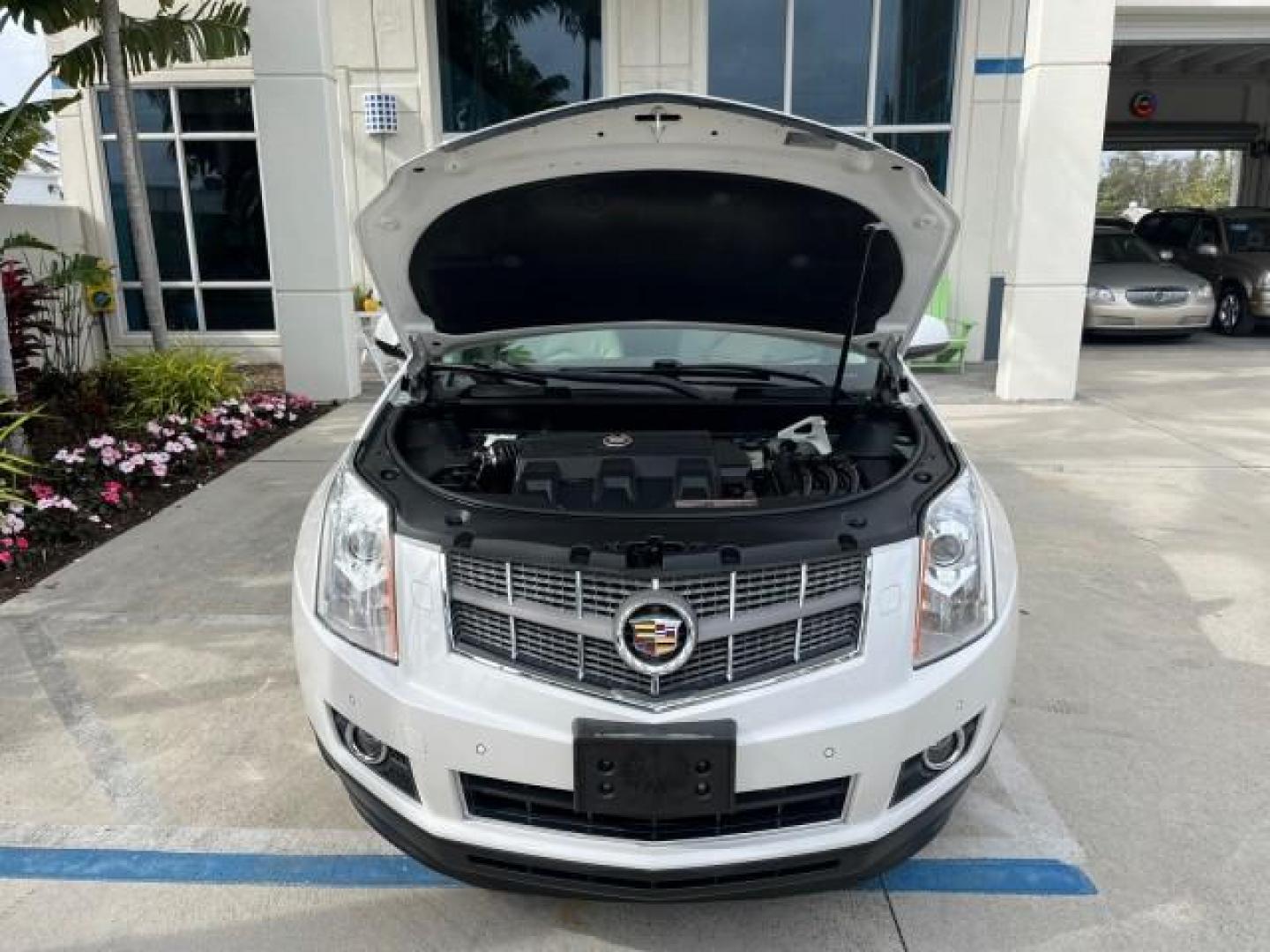 2011 Platinum Ice Tricoat /Shale w/Ebony accents Cadillac SRX Performance Collection LOW MILES 58,331 (3GYFNBEY9BS) with an 3.0L VVT DOHC V6 SIDI Engine engine, Automatic transmission, located at 4701 North Dixie Hwy, Pompano Beach, FL, 33064, (954) 422-2889, 26.240938, -80.123474 - 2011 CADILLAC SRX PERFORMANCE COLLECTION ROAD READY NAVIGATION VIN: 3GYFNBEY9BS513906 BOSE AUDIO PANORAMIC SUNROOF 4 DOOR WAGON/SPORT UTILITY NEW $ 44,085 BACK UP CAMERA/SENSORS 3.0L V6 F DOHC 24V DUAL AC NO ACCIDENTS NO RECALLS GASOLINE LEATHER BLUETOOTH BRAKING ASSIST FRONT WHEEL DRIVE PUSH START - Photo#72