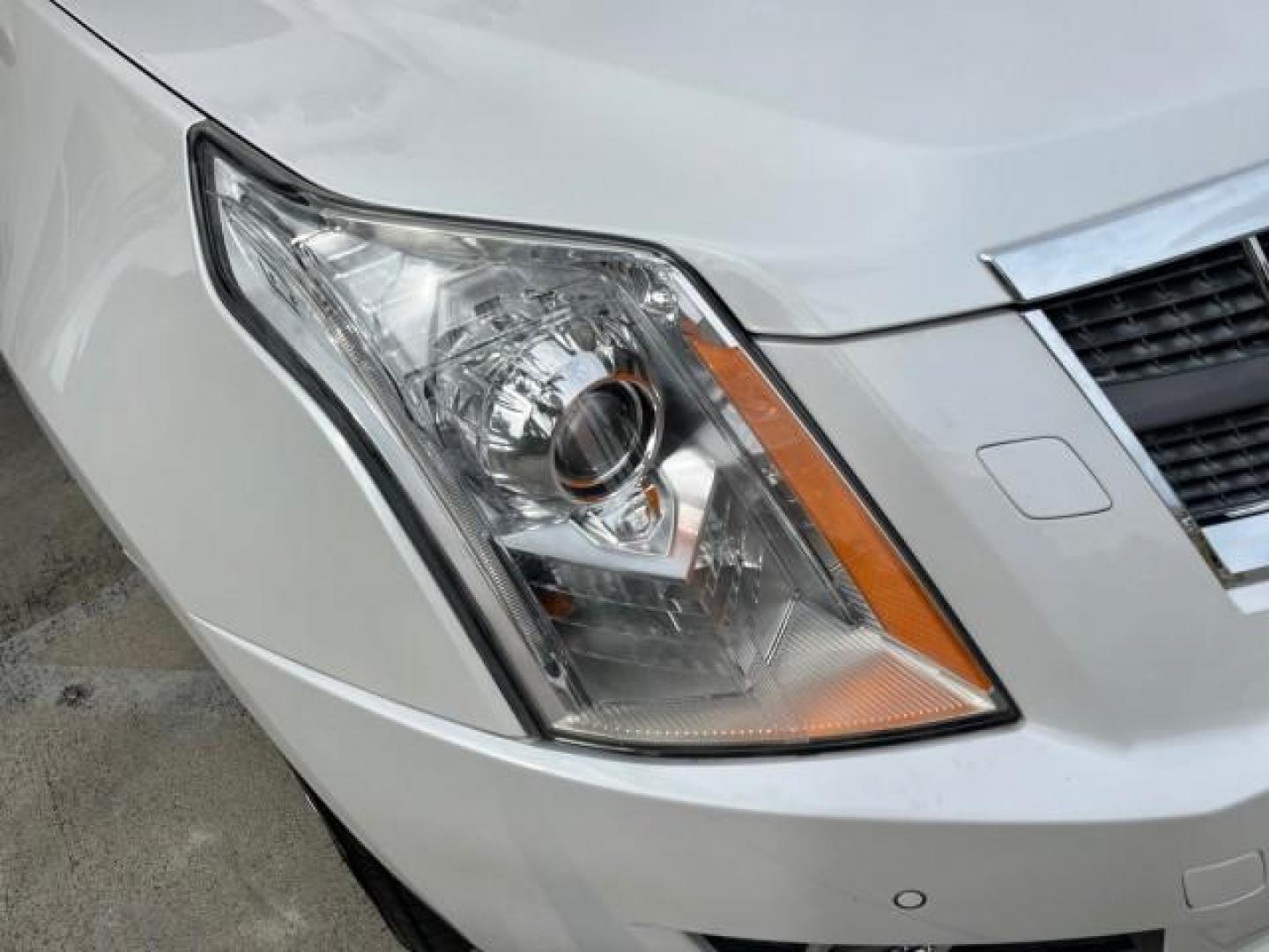 2011 Platinum Ice Tricoat /Shale w/Ebony accents Cadillac SRX Performance Collection LOW MILES 58,331 (3GYFNBEY9BS) with an 3.0L VVT DOHC V6 SIDI Engine engine, Automatic transmission, located at 4701 North Dixie Hwy, Pompano Beach, FL, 33064, (954) 422-2889, 26.240938, -80.123474 - 2011 CADILLAC SRX PERFORMANCE COLLECTION ROAD READY NAVIGATION VIN: 3GYFNBEY9BS513906 BOSE AUDIO PANORAMIC SUNROOF 4 DOOR WAGON/SPORT UTILITY NEW $ 44,085 BACK UP CAMERA/SENSORS 3.0L V6 F DOHC 24V DUAL AC NO ACCIDENTS NO RECALLS GASOLINE LEATHER BLUETOOTH BRAKING ASSIST FRONT WHEEL DRIVE PUSH START - Photo#80