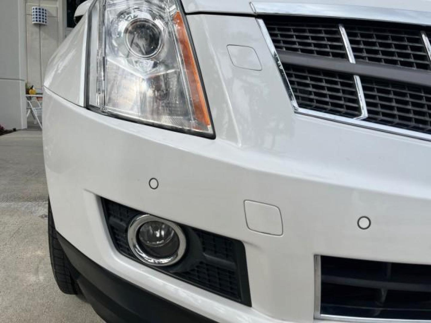 2011 Platinum Ice Tricoat /Shale w/Ebony accents Cadillac SRX Performance Collection LOW MILES 58,331 (3GYFNBEY9BS) with an 3.0L VVT DOHC V6 SIDI Engine engine, Automatic transmission, located at 4701 North Dixie Hwy, Pompano Beach, FL, 33064, (954) 422-2889, 26.240938, -80.123474 - 2011 CADILLAC SRX PERFORMANCE COLLECTION ROAD READY NAVIGATION VIN: 3GYFNBEY9BS513906 BOSE AUDIO PANORAMIC SUNROOF 4 DOOR WAGON/SPORT UTILITY NEW $ 44,085 BACK UP CAMERA/SENSORS 3.0L V6 F DOHC 24V DUAL AC NO ACCIDENTS NO RECALLS GASOLINE LEATHER BLUETOOTH BRAKING ASSIST FRONT WHEEL DRIVE PUSH START - Photo#82