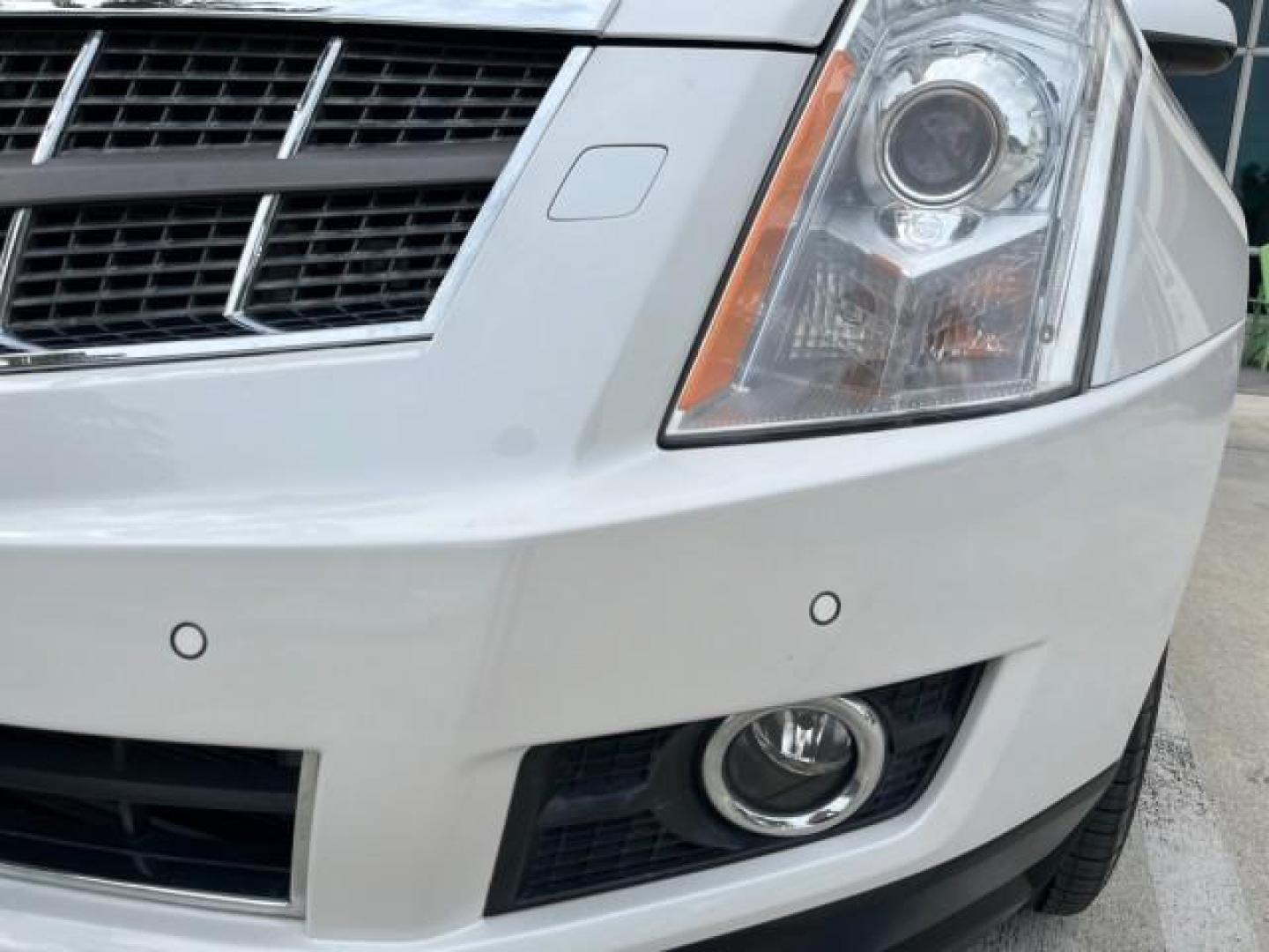 2011 Platinum Ice Tricoat /Shale w/Ebony accents Cadillac SRX Performance Collection LOW MILES 58,331 (3GYFNBEY9BS) with an 3.0L VVT DOHC V6 SIDI Engine engine, Automatic transmission, located at 4701 North Dixie Hwy, Pompano Beach, FL, 33064, (954) 422-2889, 26.240938, -80.123474 - 2011 CADILLAC SRX PERFORMANCE COLLECTION ROAD READY NAVIGATION VIN: 3GYFNBEY9BS513906 BOSE AUDIO PANORAMIC SUNROOF 4 DOOR WAGON/SPORT UTILITY NEW $ 44,085 BACK UP CAMERA/SENSORS 3.0L V6 F DOHC 24V DUAL AC NO ACCIDENTS NO RECALLS GASOLINE LEATHER BLUETOOTH BRAKING ASSIST FRONT WHEEL DRIVE PUSH START - Photo#83