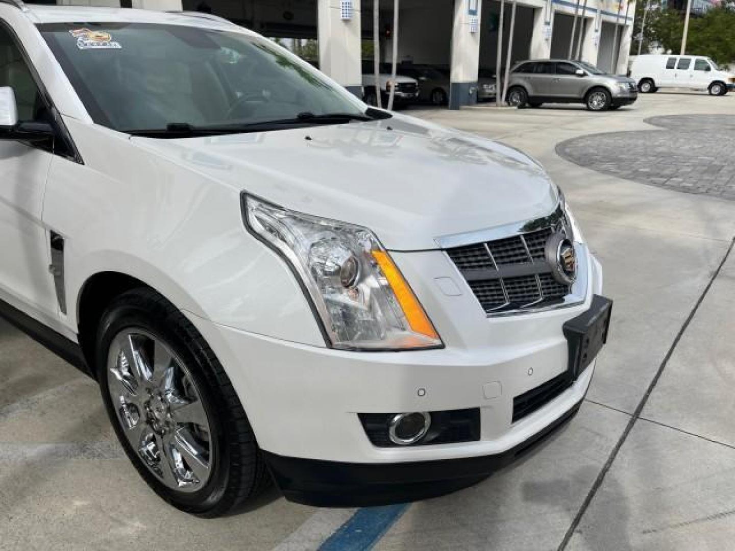 2011 Platinum Ice Tricoat /Shale w/Ebony accents Cadillac SRX Performance Collection LOW MILES 58,331 (3GYFNBEY9BS) with an 3.0L VVT DOHC V6 SIDI Engine engine, Automatic transmission, located at 4701 North Dixie Hwy, Pompano Beach, FL, 33064, (954) 422-2889, 26.240938, -80.123474 - 2011 CADILLAC SRX PERFORMANCE COLLECTION ROAD READY NAVIGATION VIN: 3GYFNBEY9BS513906 BOSE AUDIO PANORAMIC SUNROOF 4 DOOR WAGON/SPORT UTILITY NEW $ 44,085 BACK UP CAMERA/SENSORS 3.0L V6 F DOHC 24V DUAL AC NO ACCIDENTS NO RECALLS GASOLINE LEATHER BLUETOOTH BRAKING ASSIST FRONT WHEEL DRIVE PUSH START - Photo#86