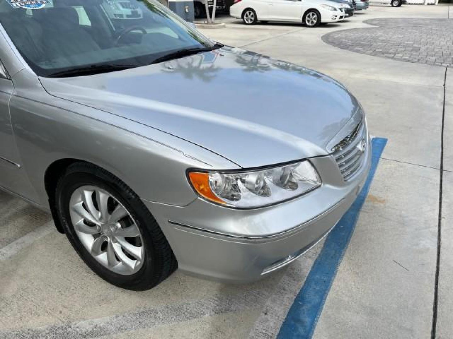 2008 Steel Gray /Gray Hyundai Azera 1 FL Limited LOW MILES 43,273 (KMHFC46F08A) with an 3.8L MPI DOHC CVVT 24-Valve Variable Intake System V6 Engine engine, Automatic transmission, located at 4701 North Dixie Hwy, Pompano Beach, FL, 33064, (954) 422-2889, 26.240938, -80.123474 - 2008 HYUNDAI AZERA LIMITED NEW $29,025 ROAD READY VIN: KMHFC46F08A292724 POWER LEATHER SEATS SEDAN 4 DR POWER SUNROOF 28 MPG 3.8L V6 F DOHC 24V HEATED MIRRORS NO ACCIDENTS NO RECALLS GASOLINE 26 SERVICE RECORDS LOW MILE 43,273 DUAL AC FRONT WHEEL DRIVE BRAKING ASSIST 1 OWNER FLORIDA Active Head Rest - Photo#82