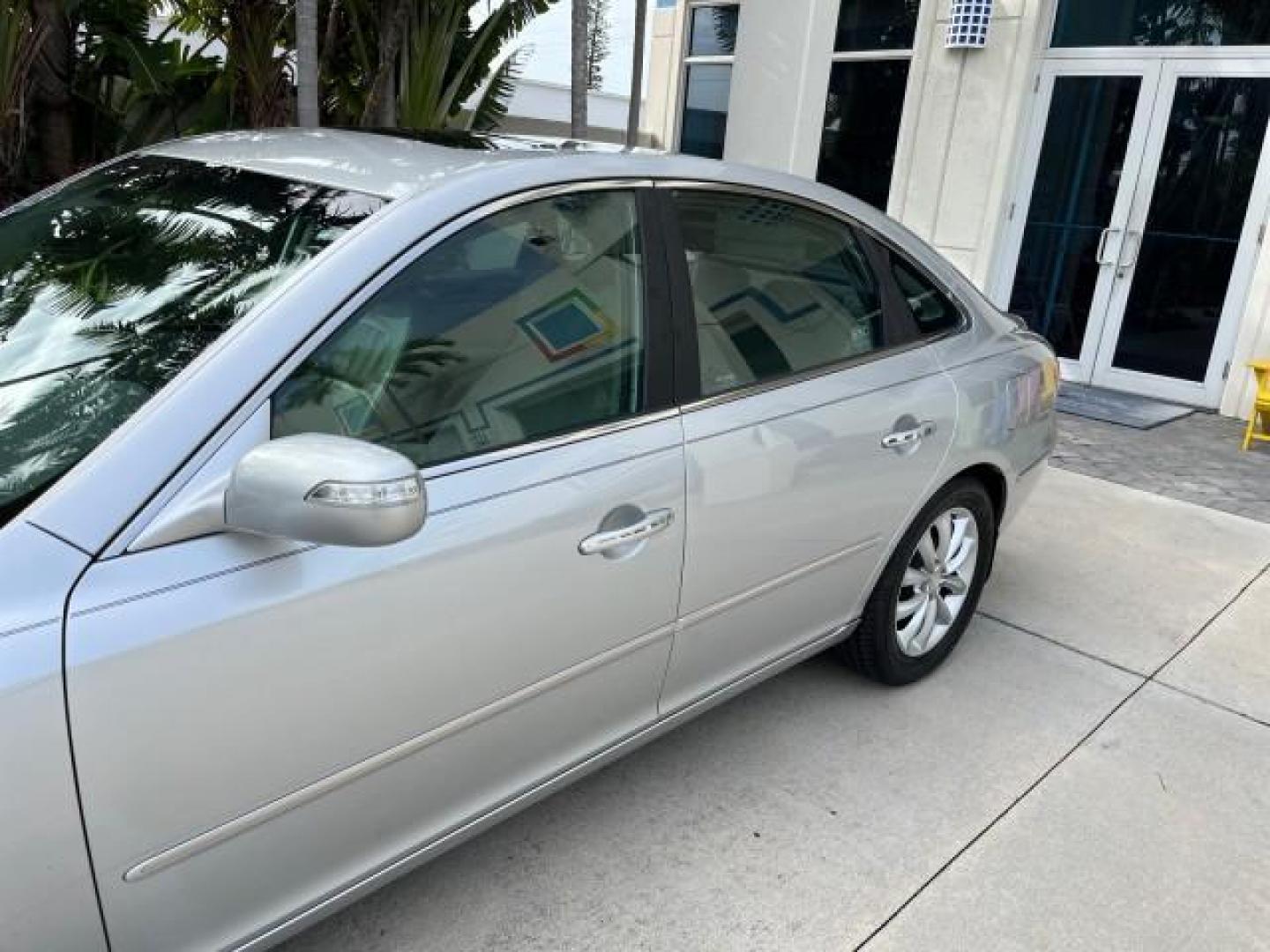 2008 Steel Gray /Gray Hyundai Azera 1 FL Limited LOW MILES 43,273 (KMHFC46F08A) with an 3.8L MPI DOHC CVVT 24-Valve Variable Intake System V6 Engine engine, Automatic transmission, located at 4701 North Dixie Hwy, Pompano Beach, FL, 33064, (954) 422-2889, 26.240938, -80.123474 - 2008 HYUNDAI AZERA LIMITED NEW $29,025 ROAD READY VIN: KMHFC46F08A292724 POWER LEATHER SEATS SEDAN 4 DR POWER SUNROOF 28 MPG 3.8L V6 F DOHC 24V HEATED MIRRORS NO ACCIDENTS NO RECALLS GASOLINE 26 SERVICE RECORDS LOW MILE 43,273 DUAL AC FRONT WHEEL DRIVE BRAKING ASSIST 1 OWNER FLORIDA Active Head Rest - Photo#84