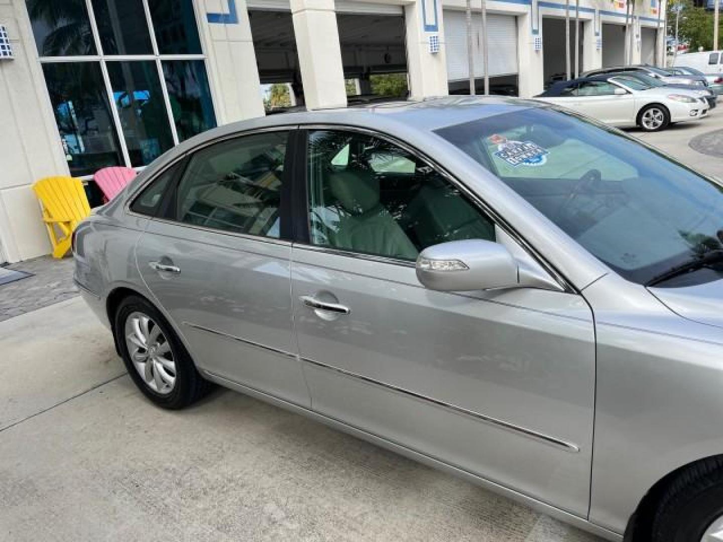 2008 Steel Gray /Gray Hyundai Azera 1 FL Limited LOW MILES 43,273 (KMHFC46F08A) with an 3.8L MPI DOHC CVVT 24-Valve Variable Intake System V6 Engine engine, Automatic transmission, located at 4701 North Dixie Hwy, Pompano Beach, FL, 33064, (954) 422-2889, 26.240938, -80.123474 - 2008 HYUNDAI AZERA LIMITED NEW $29,025 ROAD READY VIN: KMHFC46F08A292724 POWER LEATHER SEATS SEDAN 4 DR POWER SUNROOF 28 MPG 3.8L V6 F DOHC 24V HEATED MIRRORS NO ACCIDENTS NO RECALLS GASOLINE 26 SERVICE RECORDS LOW MILE 43,273 DUAL AC FRONT WHEEL DRIVE BRAKING ASSIST 1 OWNER FLORIDA Active Head Rest - Photo#85