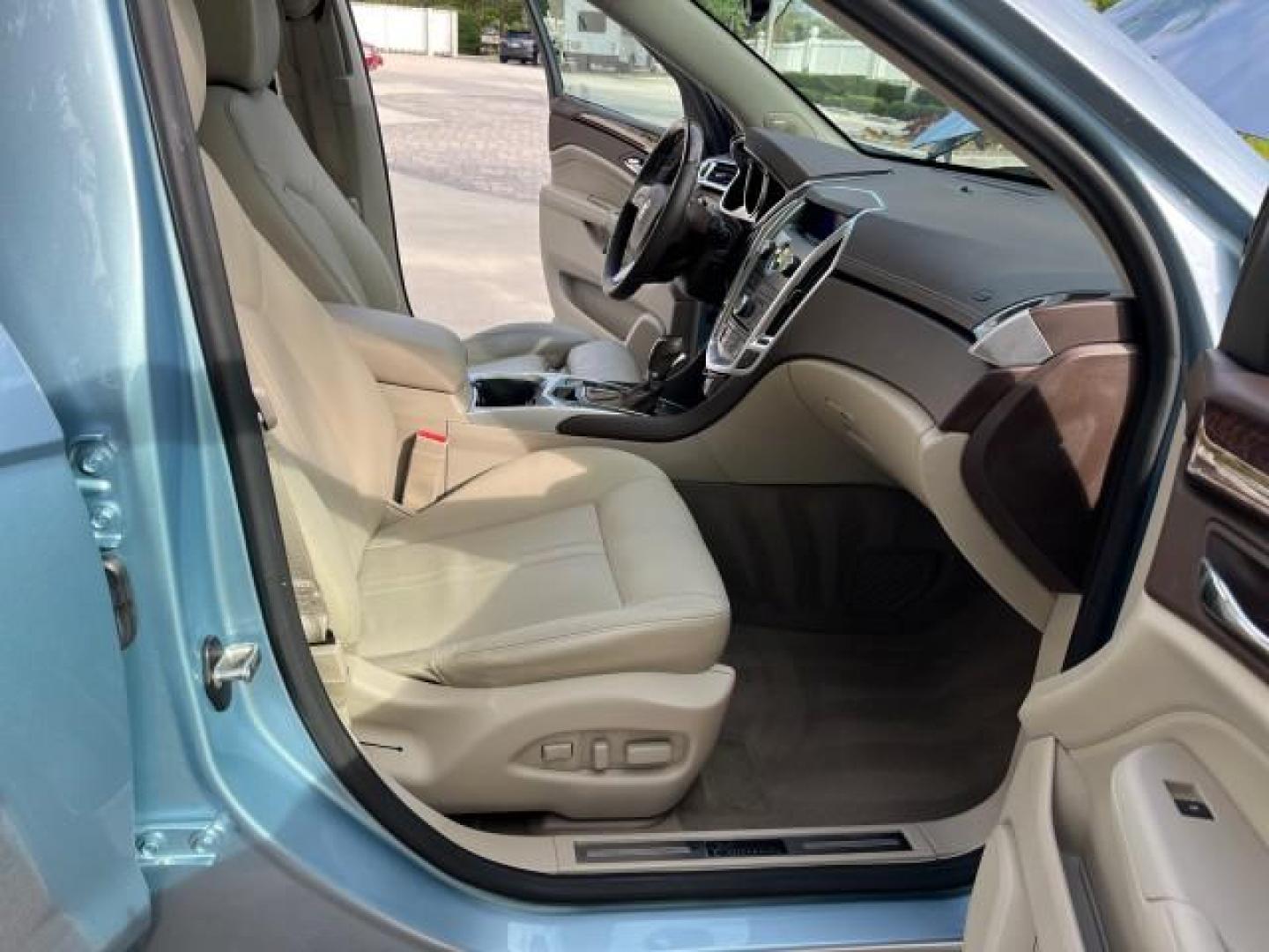 2011 Blue Frost Metalic /Shale w/Ebony accents Cadillac SRX Luxury Collection LOW MILES 40200 (3GYFNAEY7BS) with an 3.0L VVT DOHC V6 SIDI Engine engine, Automatic transmission, located at 4701 North Dixie Hwy, Pompano Beach, FL, 33064, (954) 422-2889, 26.240938, -80.123474 - OUR WEBPAGE FLORIDACARS1.COM HAS OVER 100 PHOTOS AND FREE CARFAX LINK 2011 CADILLAC SRX LUXURY COLLECTION NEW $43,240 ROAD READY VIN: 3GYFNAEY7BS633830 NO ACCIDENTS NO RECALLS 4 DOOR WAGON/ FLORIDA OWNER BLUETOOTH 3.0L V6 F DOHC 24V POWER PANORAMIC SUNROOF GASOLINE BACK UP CAMERA PARK SENSORS FRONT - Photo#12