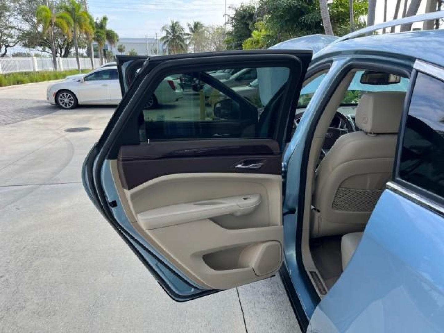 2011 Blue Frost Metalic /Shale w/Ebony accents Cadillac SRX Luxury Collection LOW MILES 40200 (3GYFNAEY7BS) with an 3.0L VVT DOHC V6 SIDI Engine engine, Automatic transmission, located at 4701 North Dixie Hwy, Pompano Beach, FL, 33064, (954) 422-2889, 26.240938, -80.123474 - OUR WEBPAGE FLORIDACARS1.COM HAS OVER 100 PHOTOS AND FREE CARFAX LINK 2011 CADILLAC SRX LUXURY COLLECTION NEW $43,240 ROAD READY VIN: 3GYFNAEY7BS633830 NO ACCIDENTS NO RECALLS 4 DOOR WAGON/ FLORIDA OWNER BLUETOOTH 3.0L V6 F DOHC 24V POWER PANORAMIC SUNROOF GASOLINE BACK UP CAMERA PARK SENSORS FRONT - Photo#13