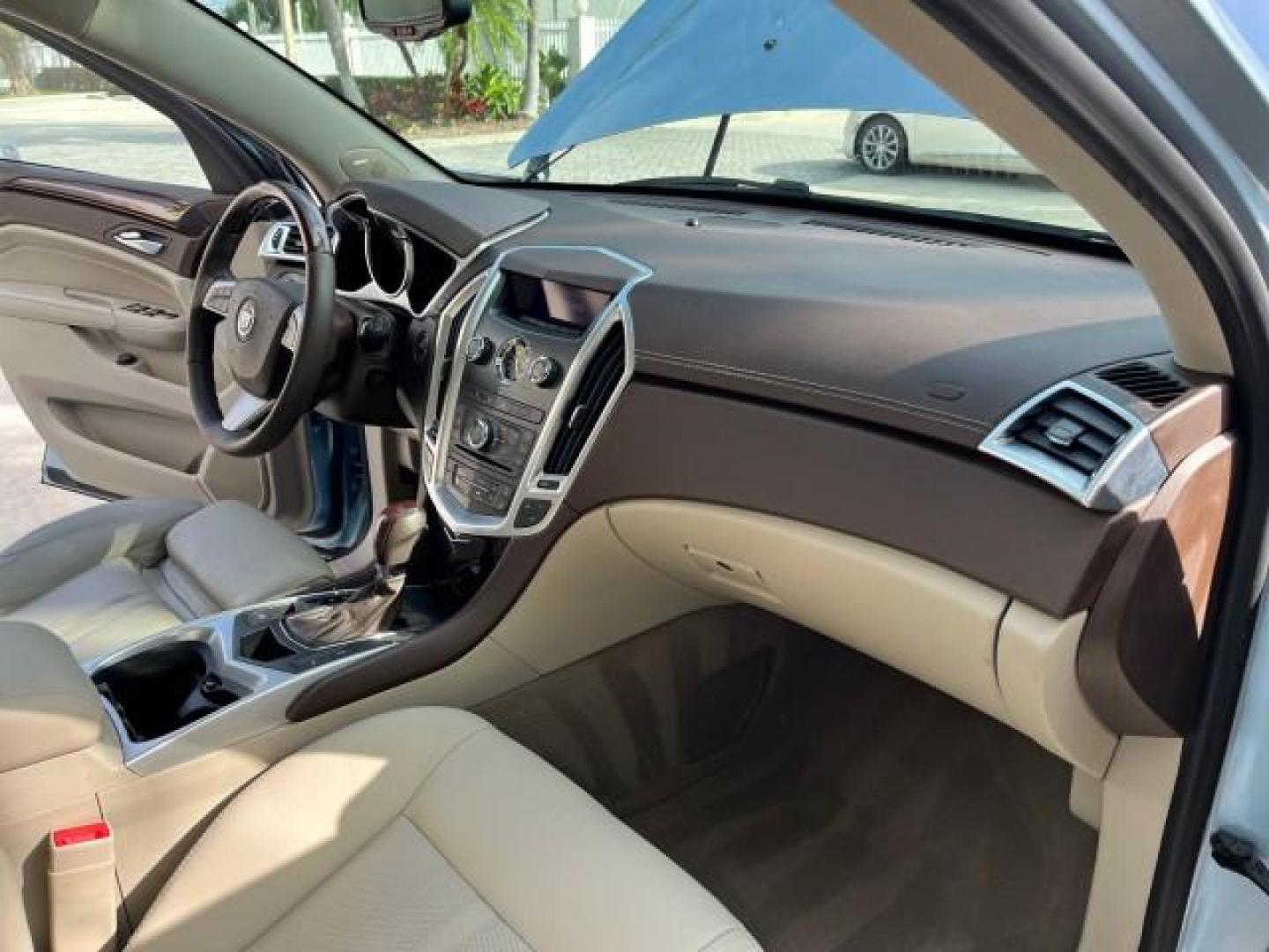 2011 Blue Frost Metalic /Shale w/Ebony accents Cadillac SRX Luxury Collection LOW MILES 40200 (3GYFNAEY7BS) with an 3.0L VVT DOHC V6 SIDI Engine engine, Automatic transmission, located at 4701 North Dixie Hwy, Pompano Beach, FL, 33064, (954) 422-2889, 26.240938, -80.123474 - OUR WEBPAGE FLORIDACARS1.COM HAS OVER 100 PHOTOS AND FREE CARFAX LINK 2011 CADILLAC SRX LUXURY COLLECTION NEW $43,240 ROAD READY VIN: 3GYFNAEY7BS633830 NO ACCIDENTS NO RECALLS 4 DOOR WAGON/ FLORIDA OWNER BLUETOOTH 3.0L V6 F DOHC 24V POWER PANORAMIC SUNROOF GASOLINE BACK UP CAMERA PARK SENSORS FRONT - Photo#28