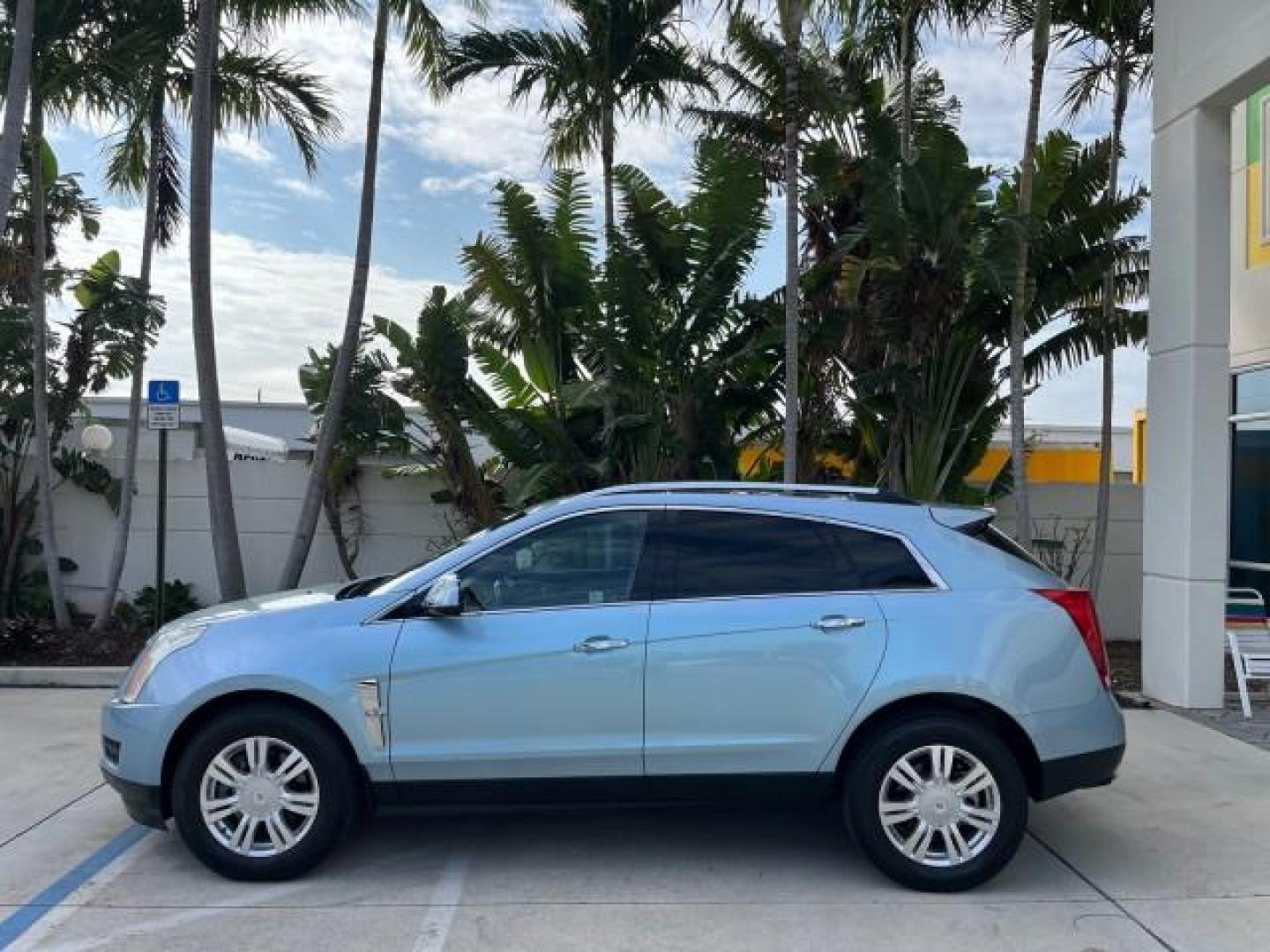 2011 Blue Frost Metalic /Shale w/Ebony accents Cadillac SRX Luxury Collection LOW MILES 40200 (3GYFNAEY7BS) with an 3.0L VVT DOHC V6 SIDI Engine engine, Automatic transmission, located at 4701 North Dixie Hwy, Pompano Beach, FL, 33064, (954) 422-2889, 26.240938, -80.123474 - OUR WEBPAGE FLORIDACARS1.COM HAS OVER 100 PHOTOS AND FREE CARFAX LINK 2011 CADILLAC SRX LUXURY COLLECTION NEW $43,240 ROAD READY VIN: 3GYFNAEY7BS633830 NO ACCIDENTS NO RECALLS 4 DOOR WAGON/ FLORIDA OWNER BLUETOOTH 3.0L V6 F DOHC 24V POWER PANORAMIC SUNROOF GASOLINE BACK UP CAMERA PARK SENSORS FRONT - Photo#4